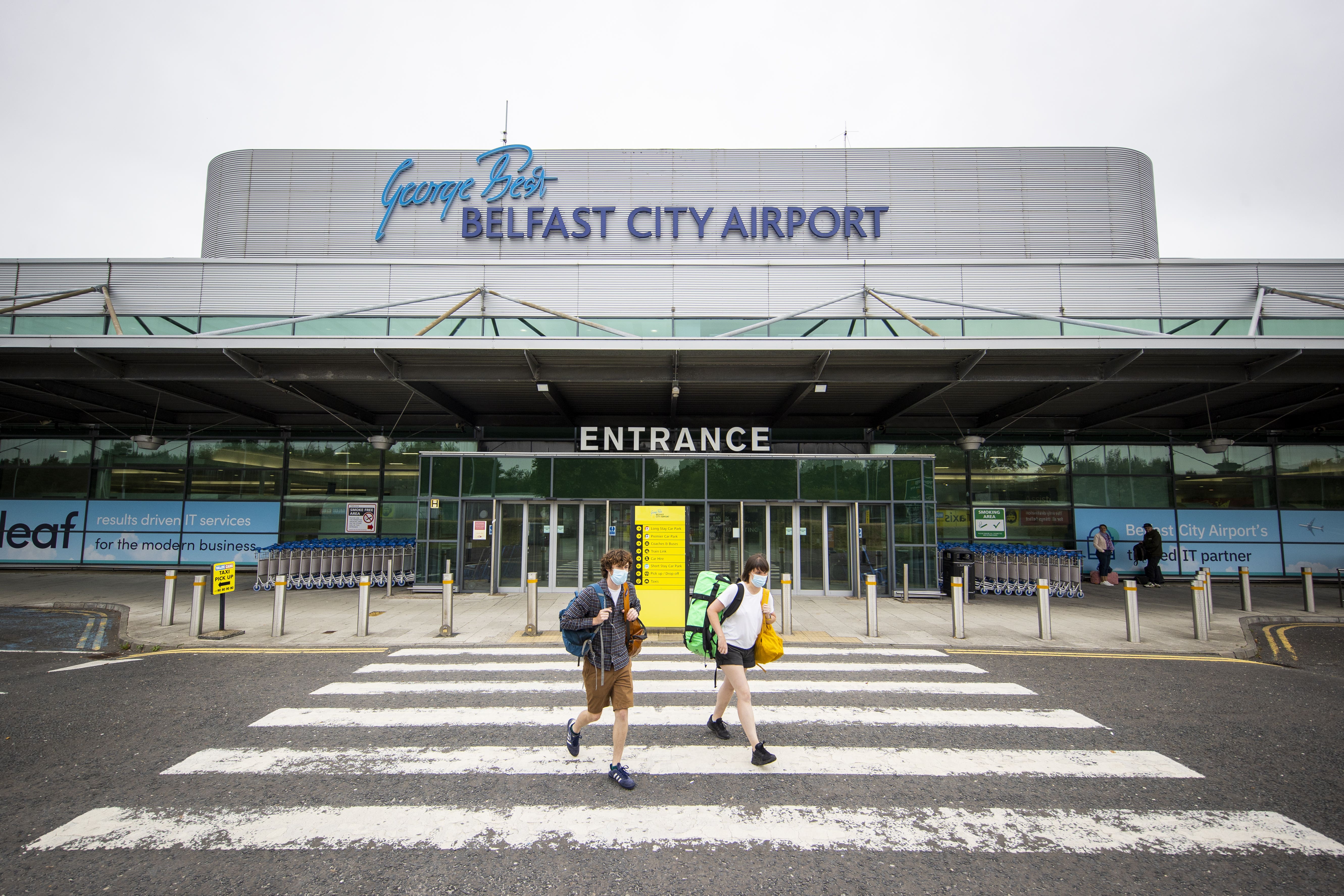 People walking from the terminal at George Best Belfast City Airport (Liam McBurney/PA)