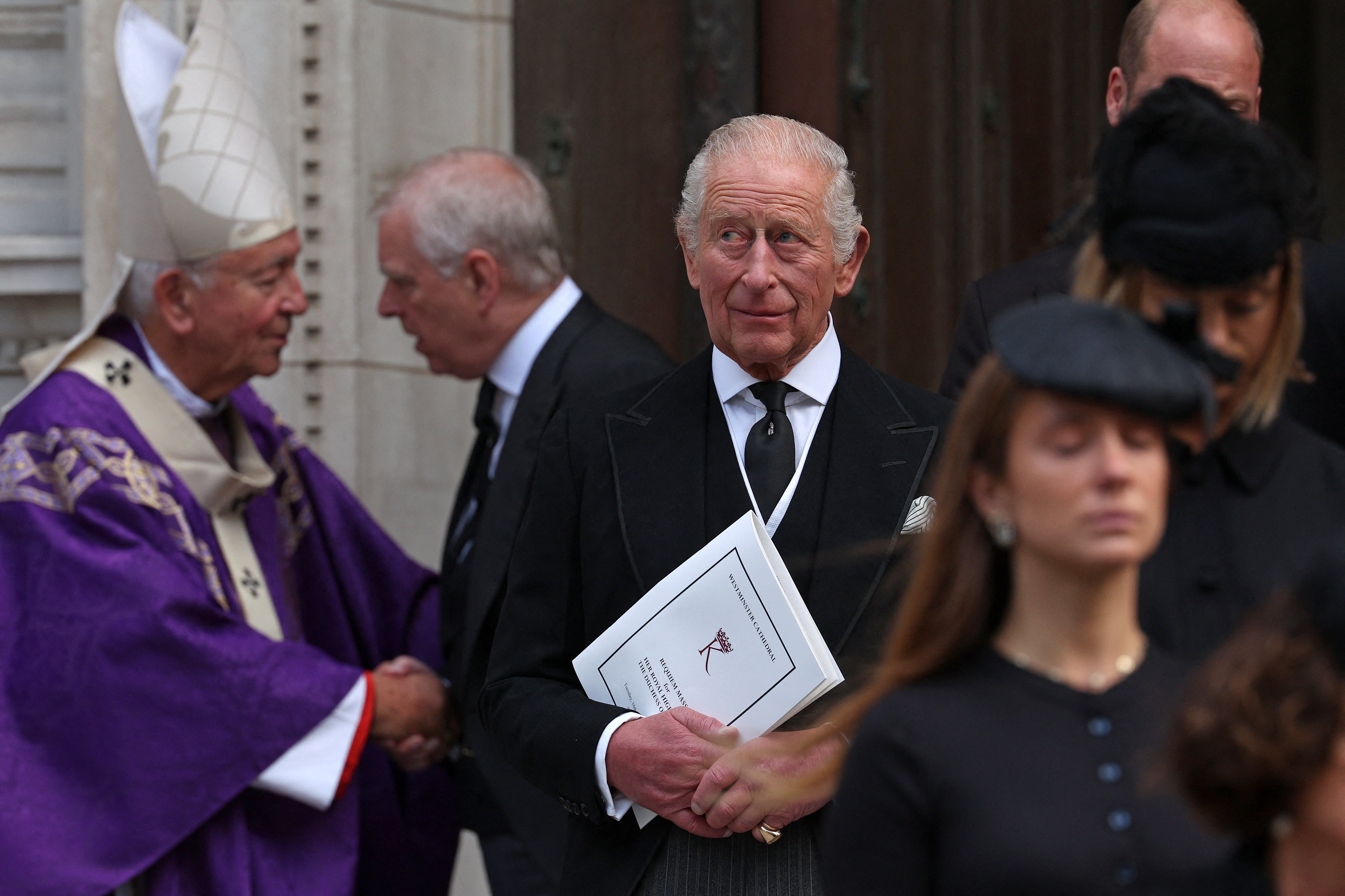 Prince Andrew and his brother, the King, were among the mourners