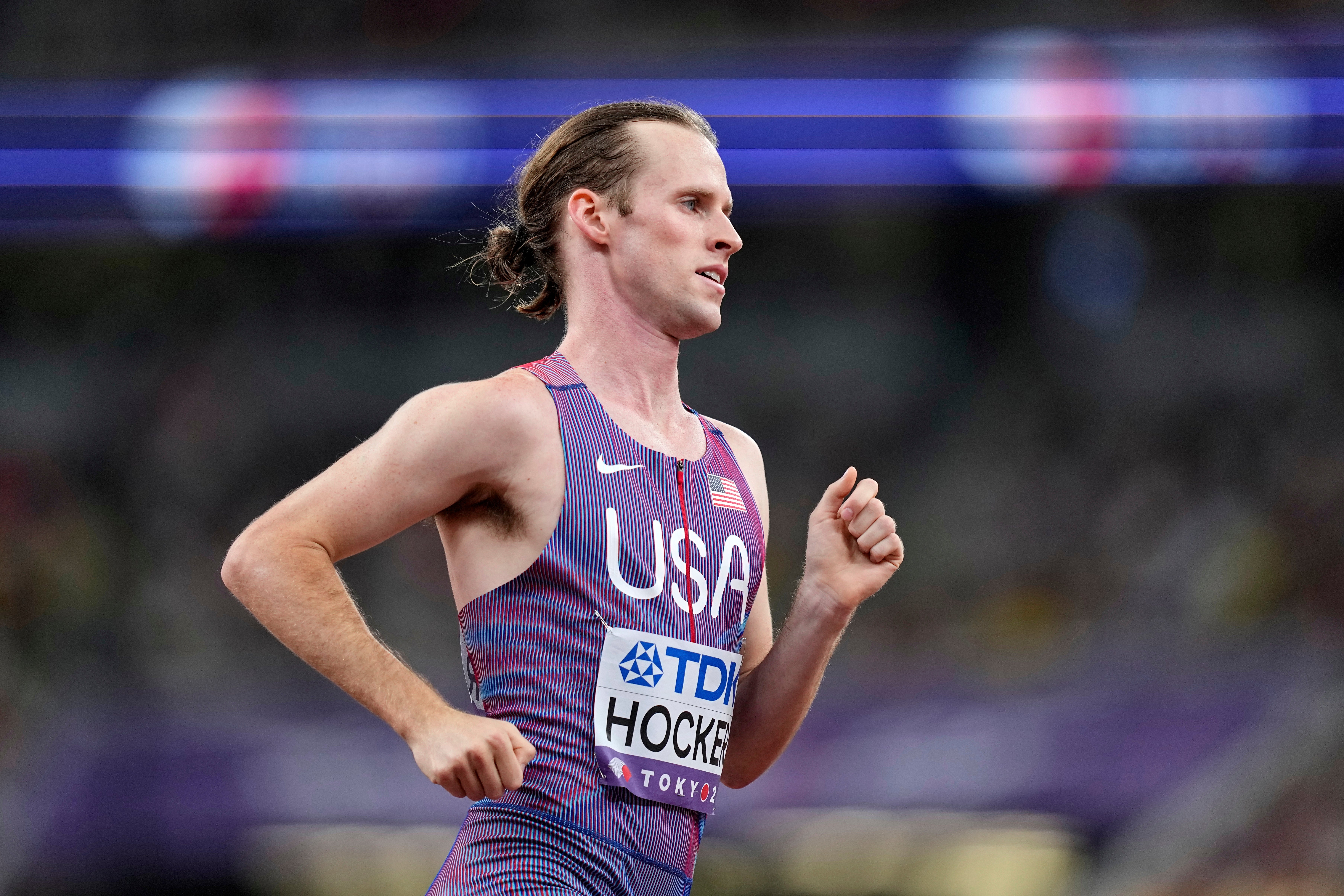 <p>Cole Hocker races in a men's 1,500 meters semifinal at the World Athletics Championships</p>