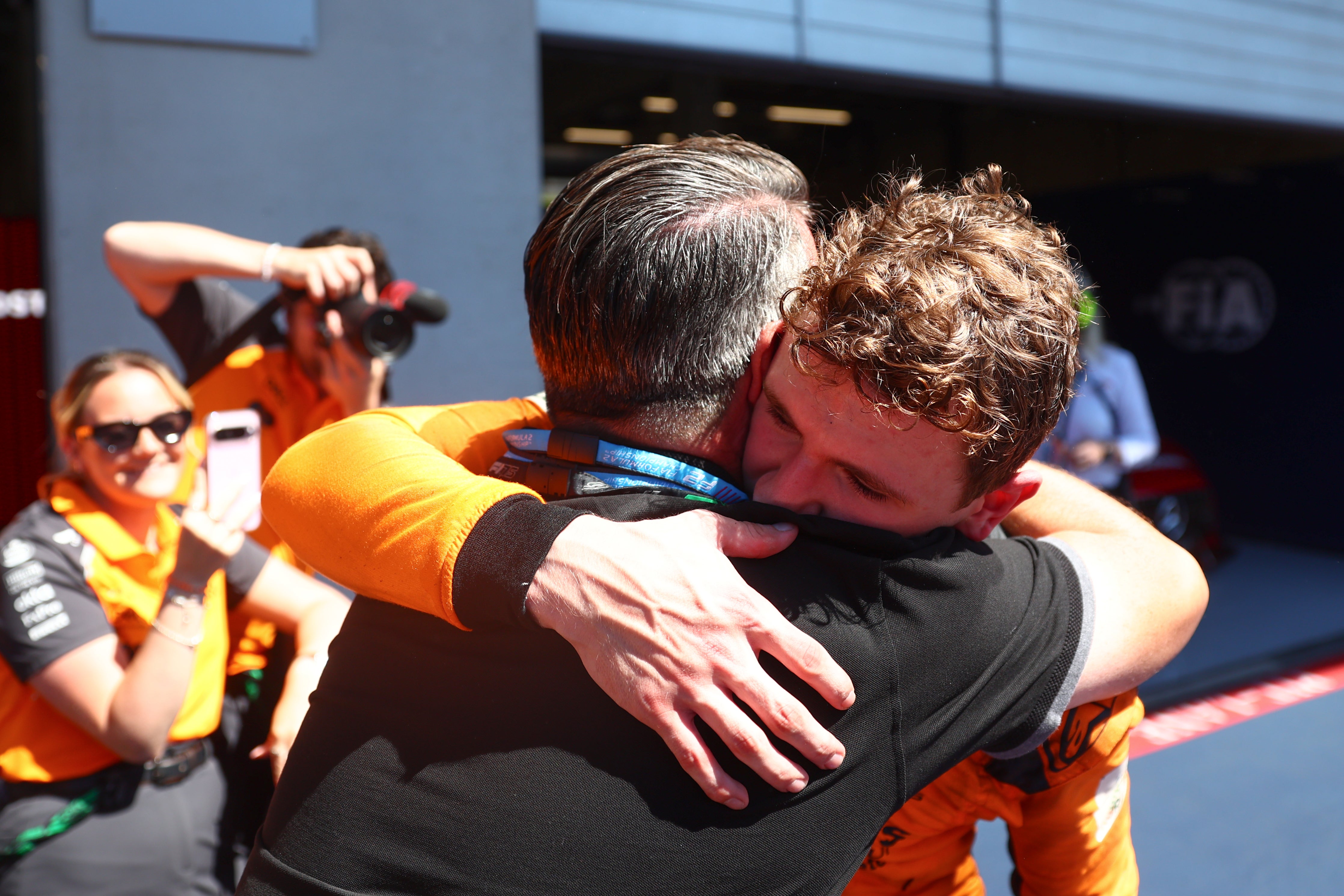 Dunne embraces his father, Noel