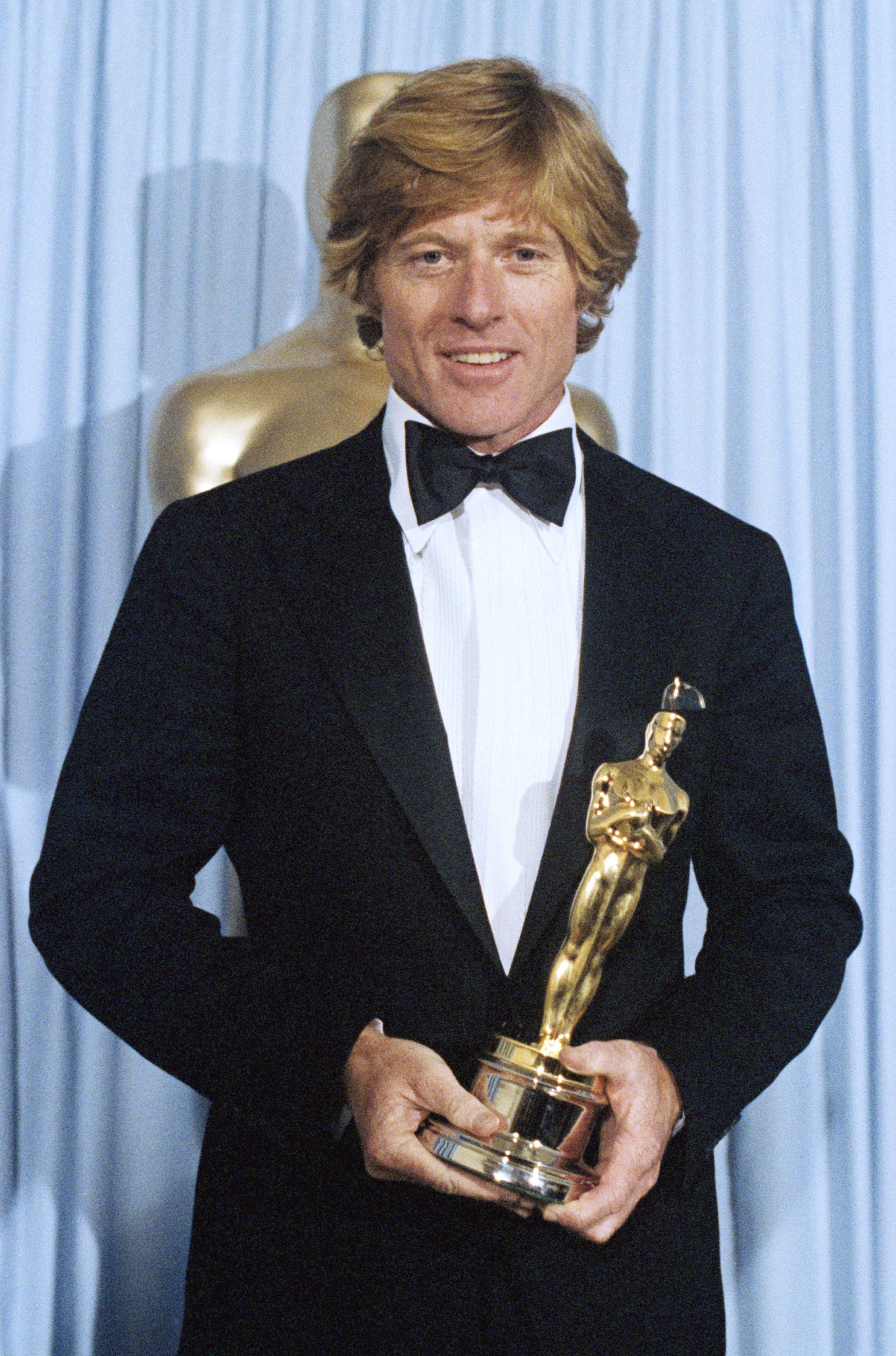 Redford holding the Oscar he won for best director for Ordinary People at the Academy Awards in 1981