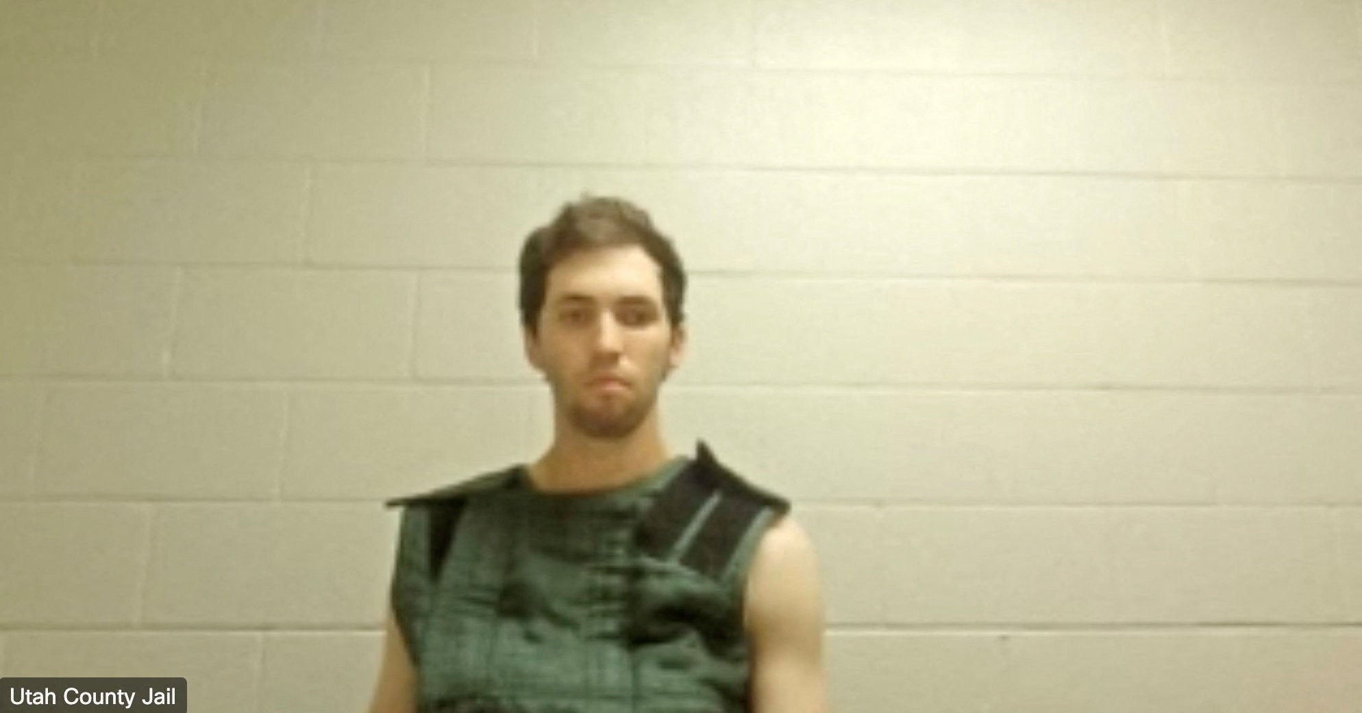 In this image from video provided by Utah State Courts, Tyler James Robinson attends a virtual court hearing from prison to hear the charges for his alleged murder of Charlie Kirk