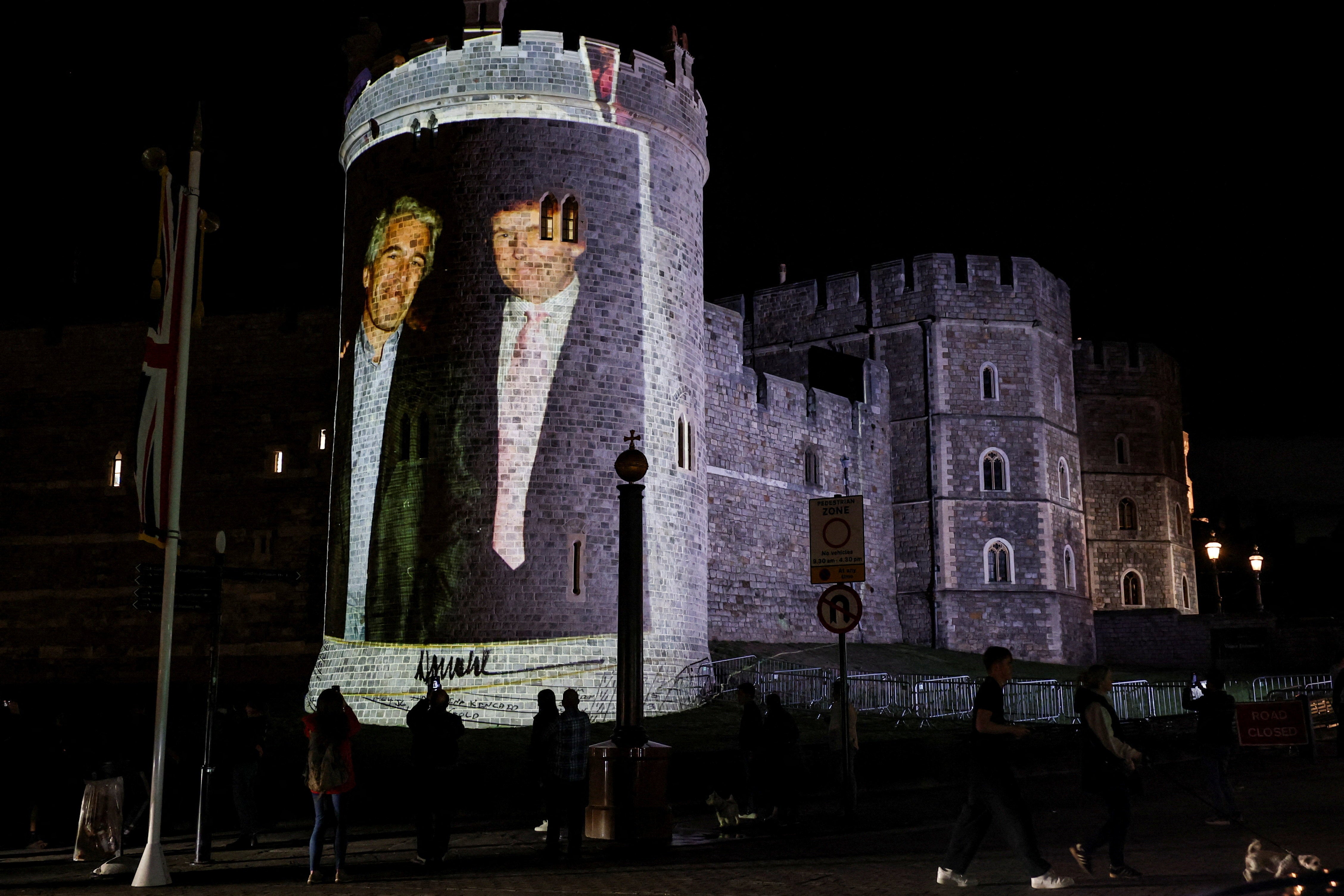 Several pictures of the US president and the disgraced financier were projected onto the side of the royal residence on Tuesday evening