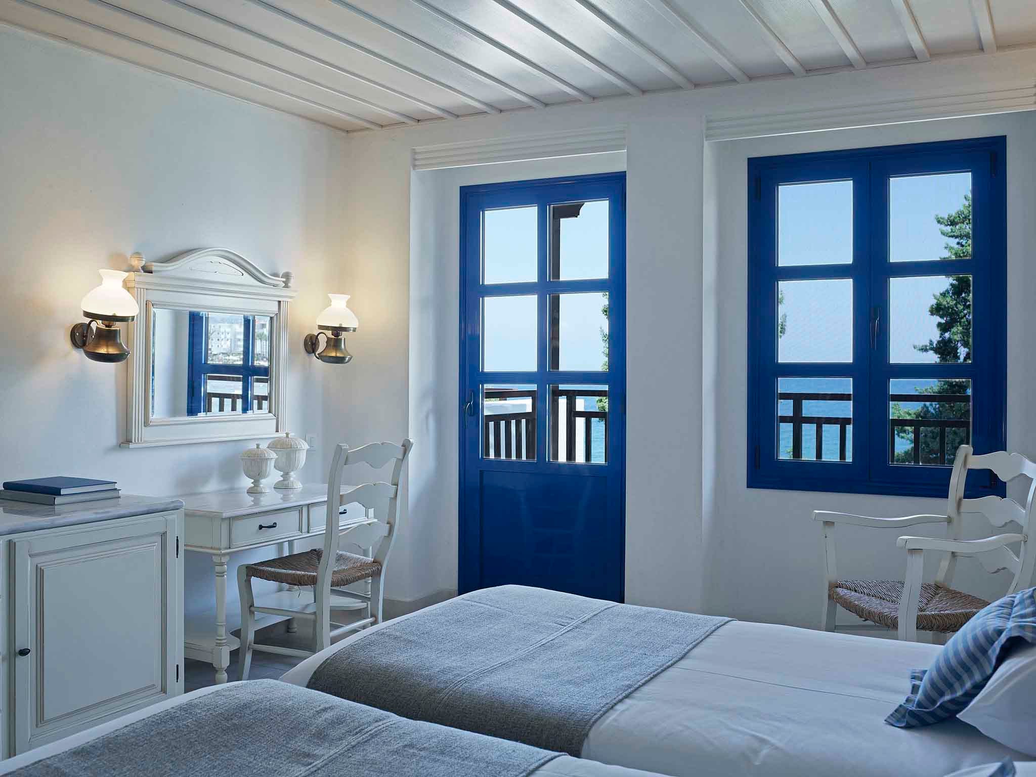 Rooms and suites at Crete Maris are styled like traditional Greek homes