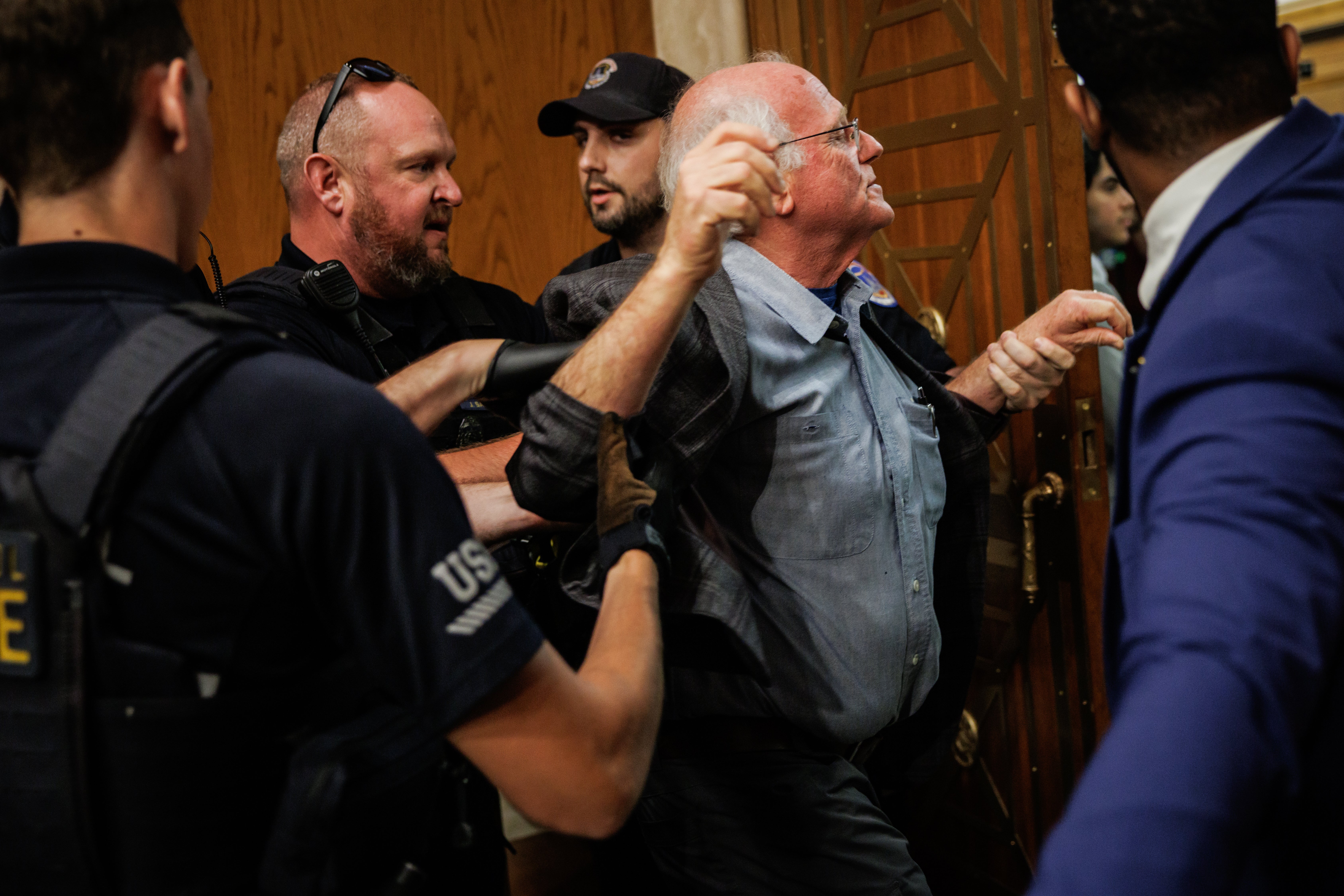 Cohen is detained during a hearing held by controversial Robert F Kennedy Jr in May 2025