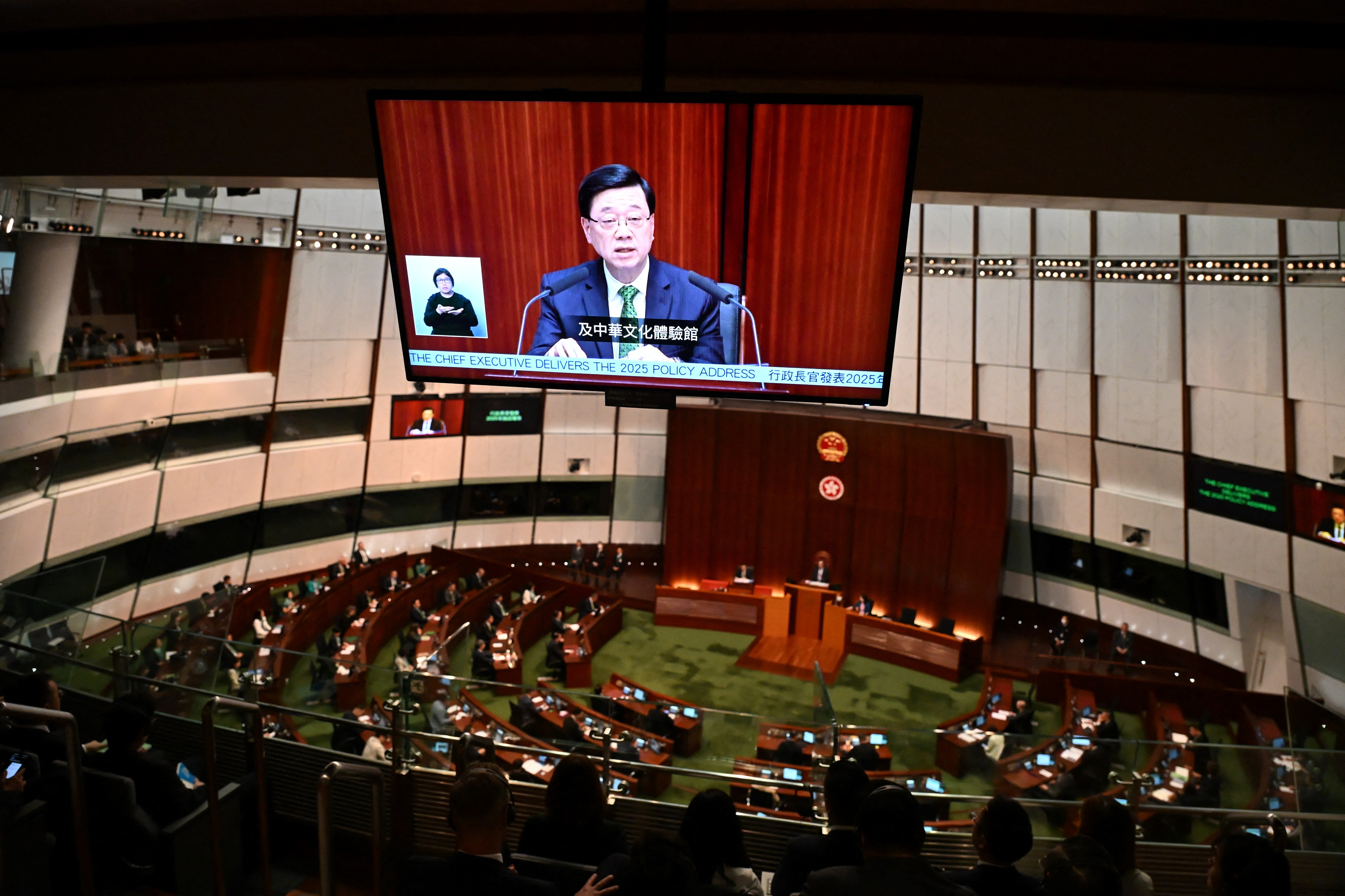 Hong Kong chief executive John Lee delivers his annual policy address at Central Government office