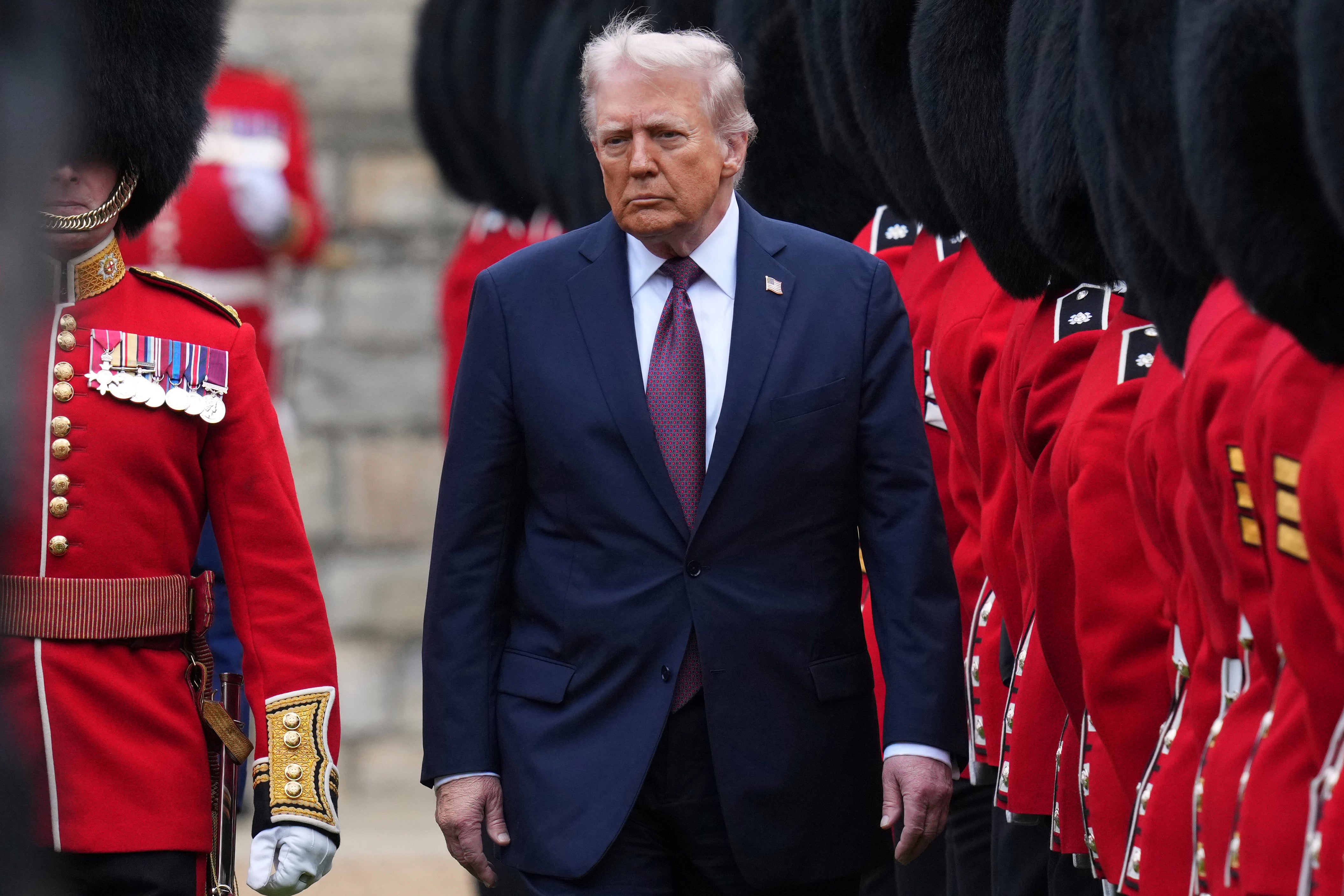 Trump reviews the troops at Windsor Castle during his ceremonial welcome on 17 September