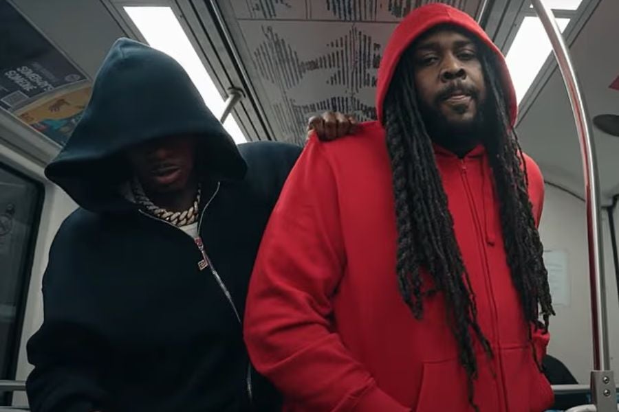 DaBaby (left) reenacted the viral moment Ukrainian refugee Iryna Zarutska was fatally stabbed aboard Charlotte’s Lynx Blue Line in his music video for 'Save Me'