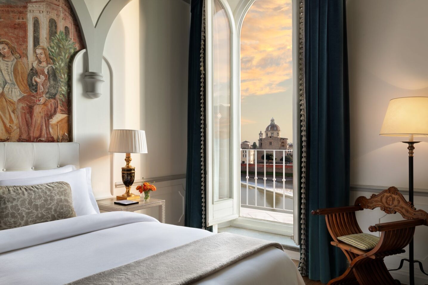 Wake up to the sound of swallows chirping and the River Arno cascading over the weir just outside your window at The St. Regis Florence