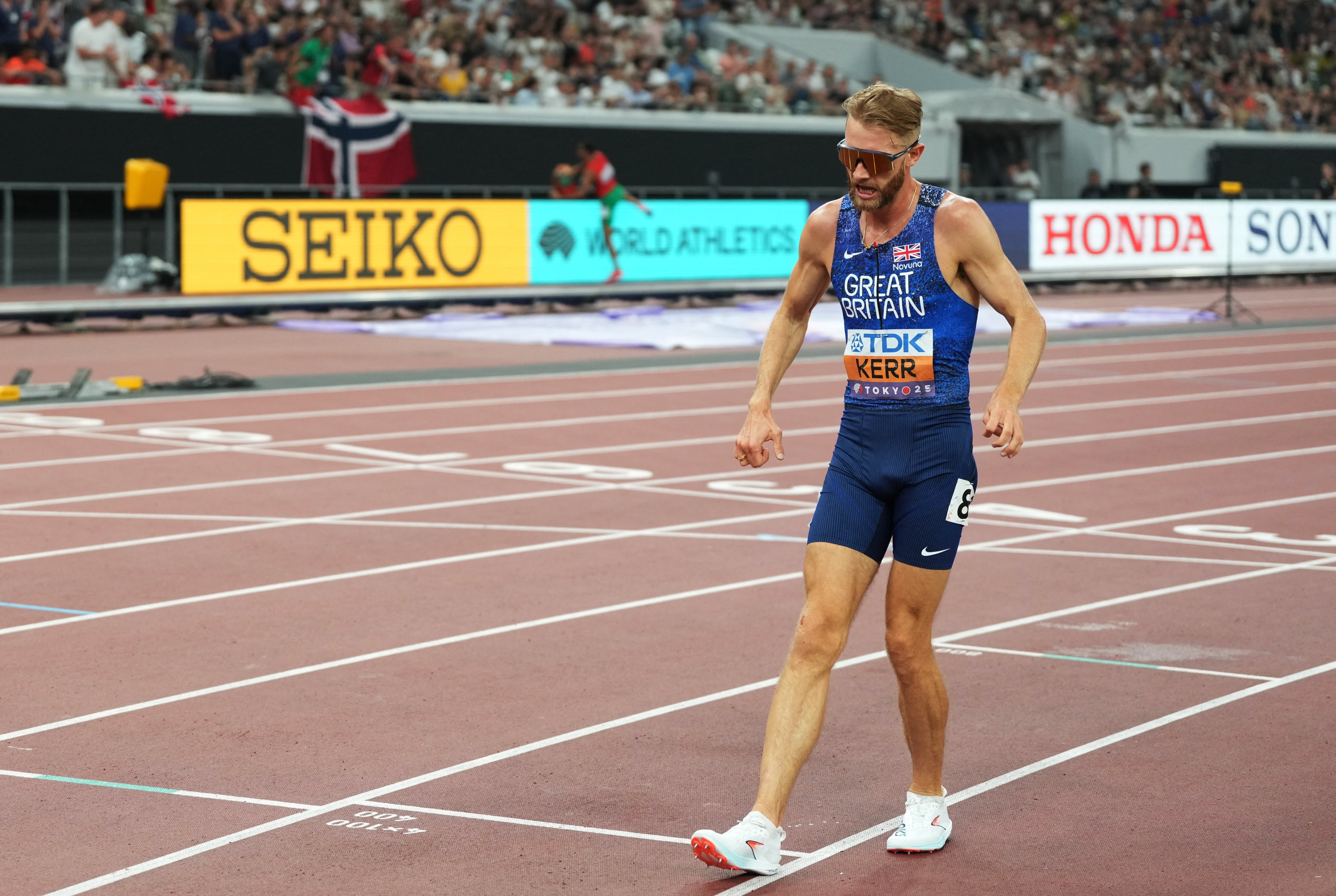 <p>Josh Kerr limped over the finish line after injury forced the Scot to pull up in the 1500m final </p>