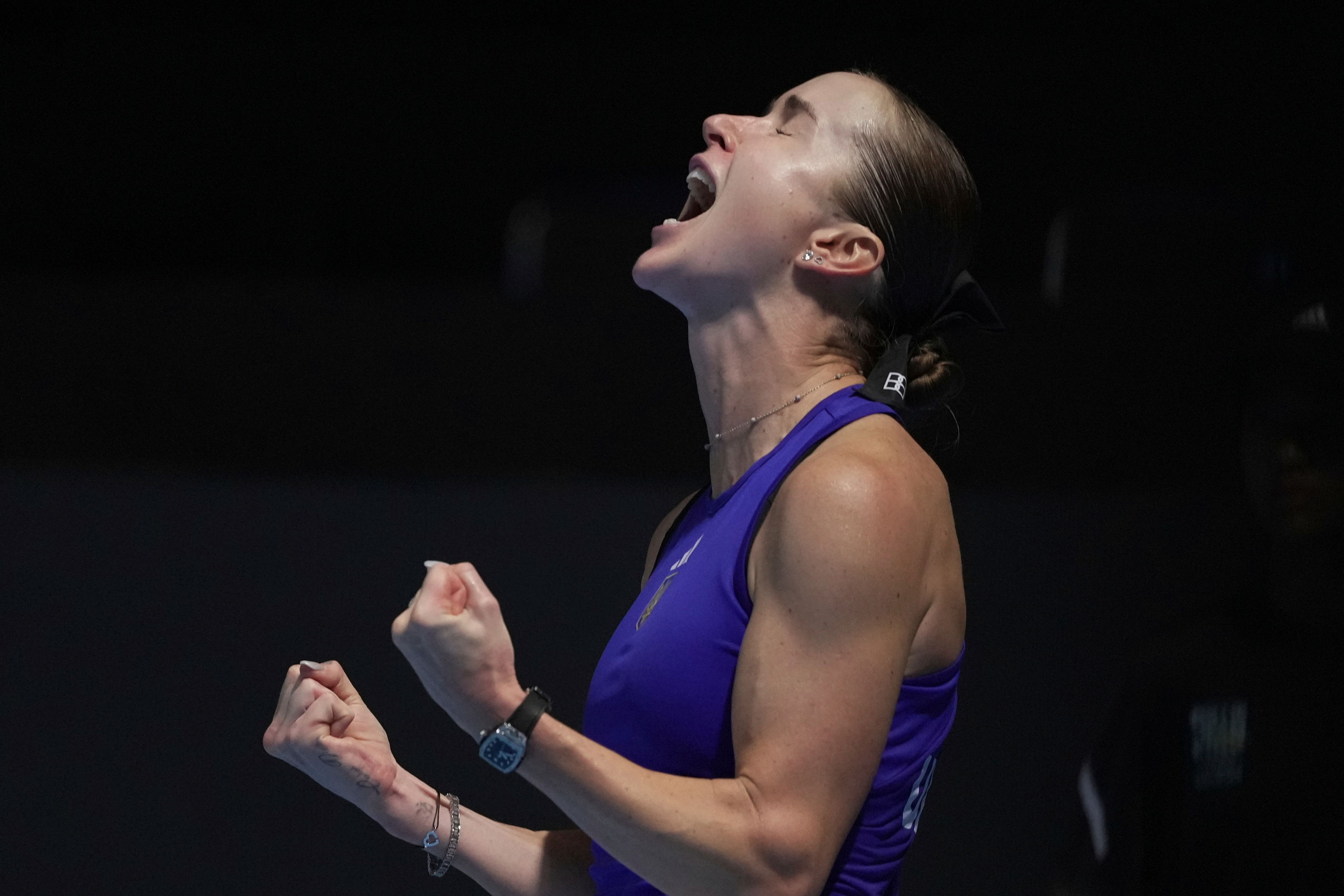 Elina Svitolina celebrates after defeating Paula Badosa (Andy Wong/AP)