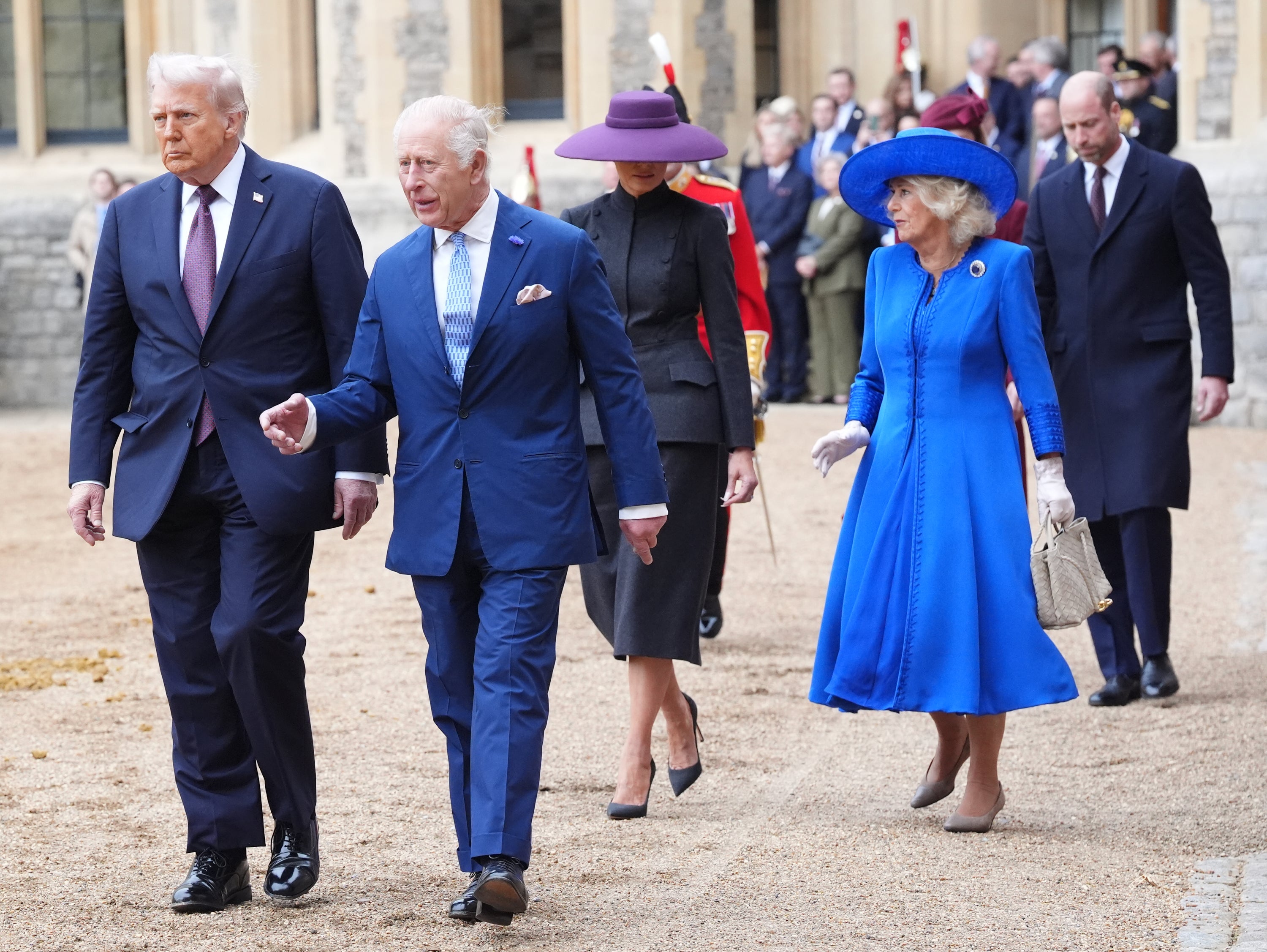 President Donald Trump and King Charles III followed by First Lady Melania Trump and Queen Camilla during the ceremonial welcome during the State visit on September 17, 2025 in Windsor, England