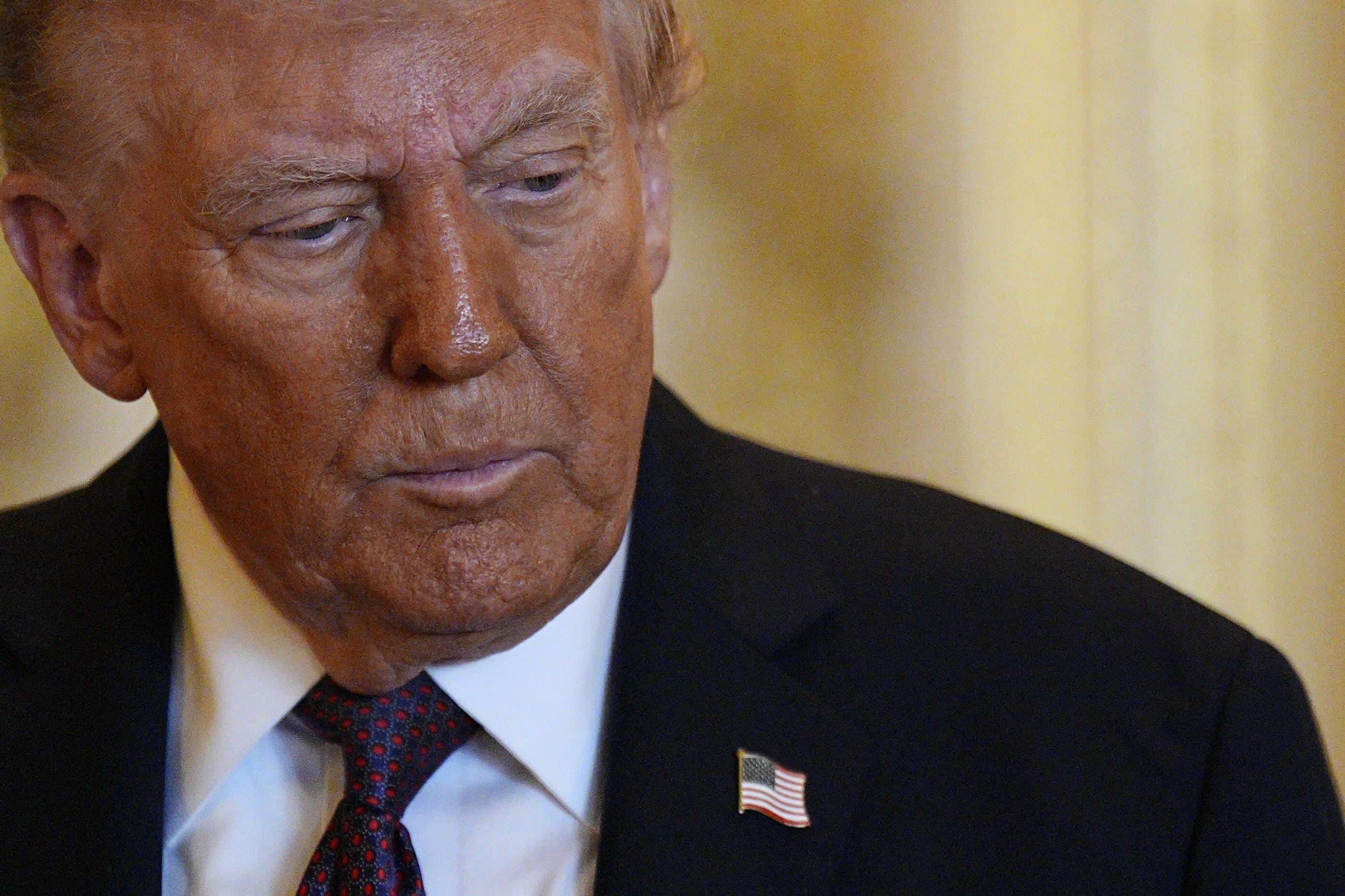 US President Donald Trump views items on display during a visit to the Royal Collection exhibition, in the Green Drawing Room at Windsor Castle, Berkshire, on day one of the president’s second state visit to the UK (Aaron Chown/PA)
