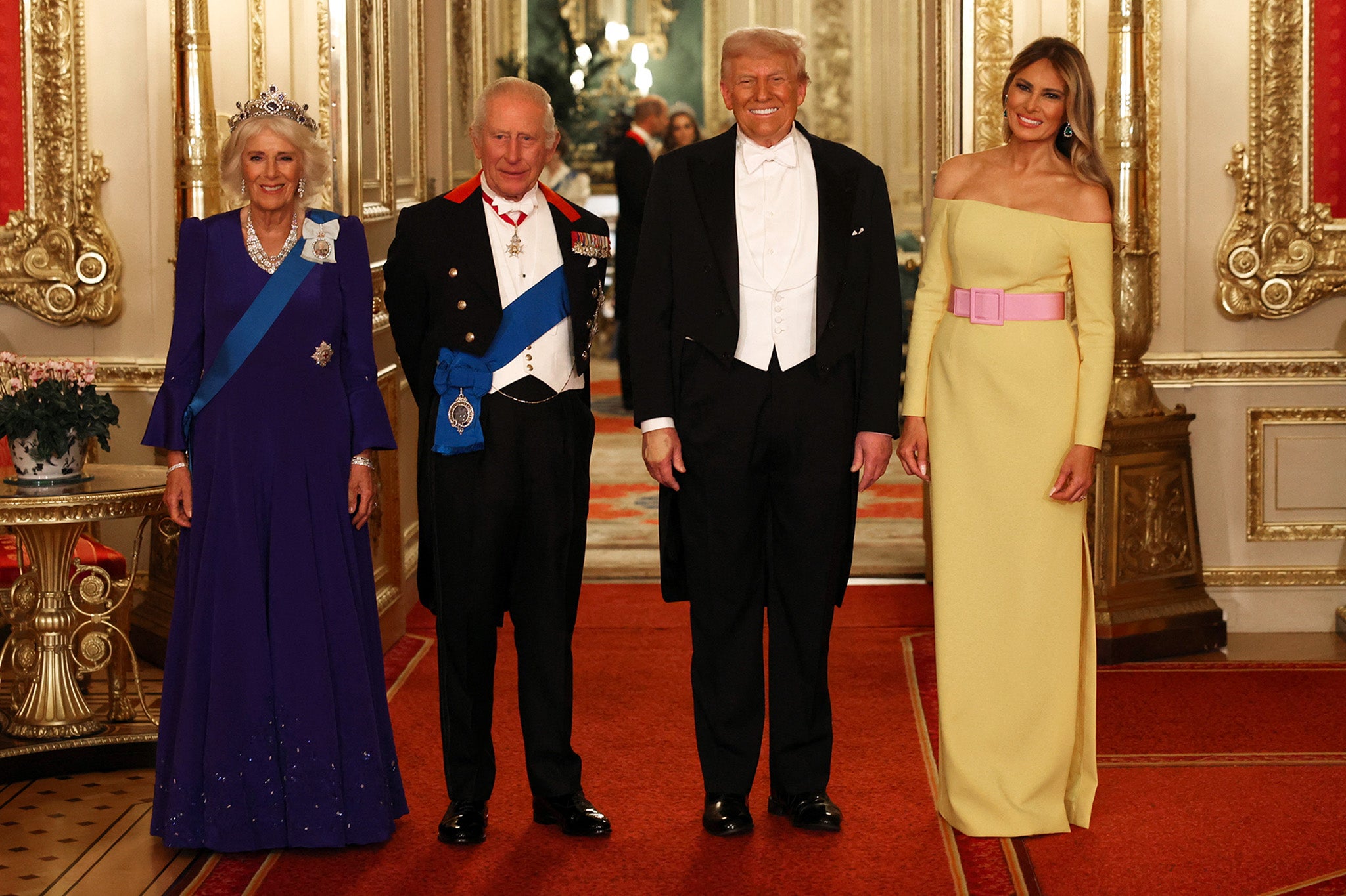 The Trumps posed with King Charles and Queen Camilla ahead of the dinner; here the belt on Melania’s dress appears to be a pastel pink