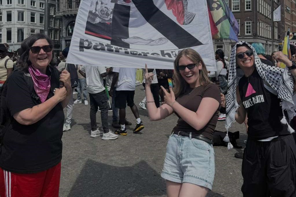 Solène Gray attends a protest in the Netherlands. Gray says she was regularly bullied and humiliated at school, by both pupils and teachers, before allegedly being kicked out onto the streets by her parents at age 18.