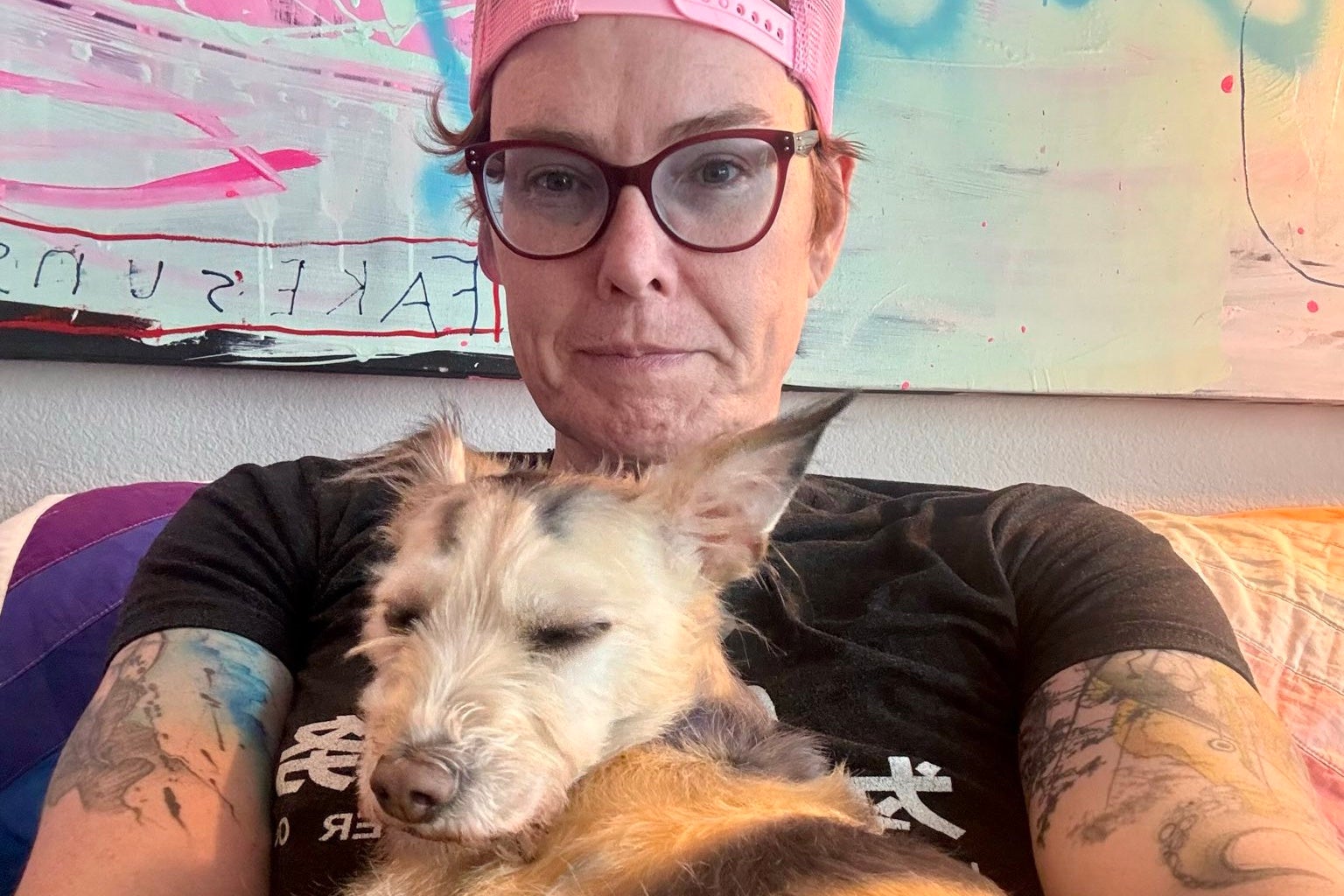 Jane Arc with her support dog Noah Arc. This March, Arc was crossing the road in San Francisco when a driver started screaming out their window that they were ‘going to kill [her]’