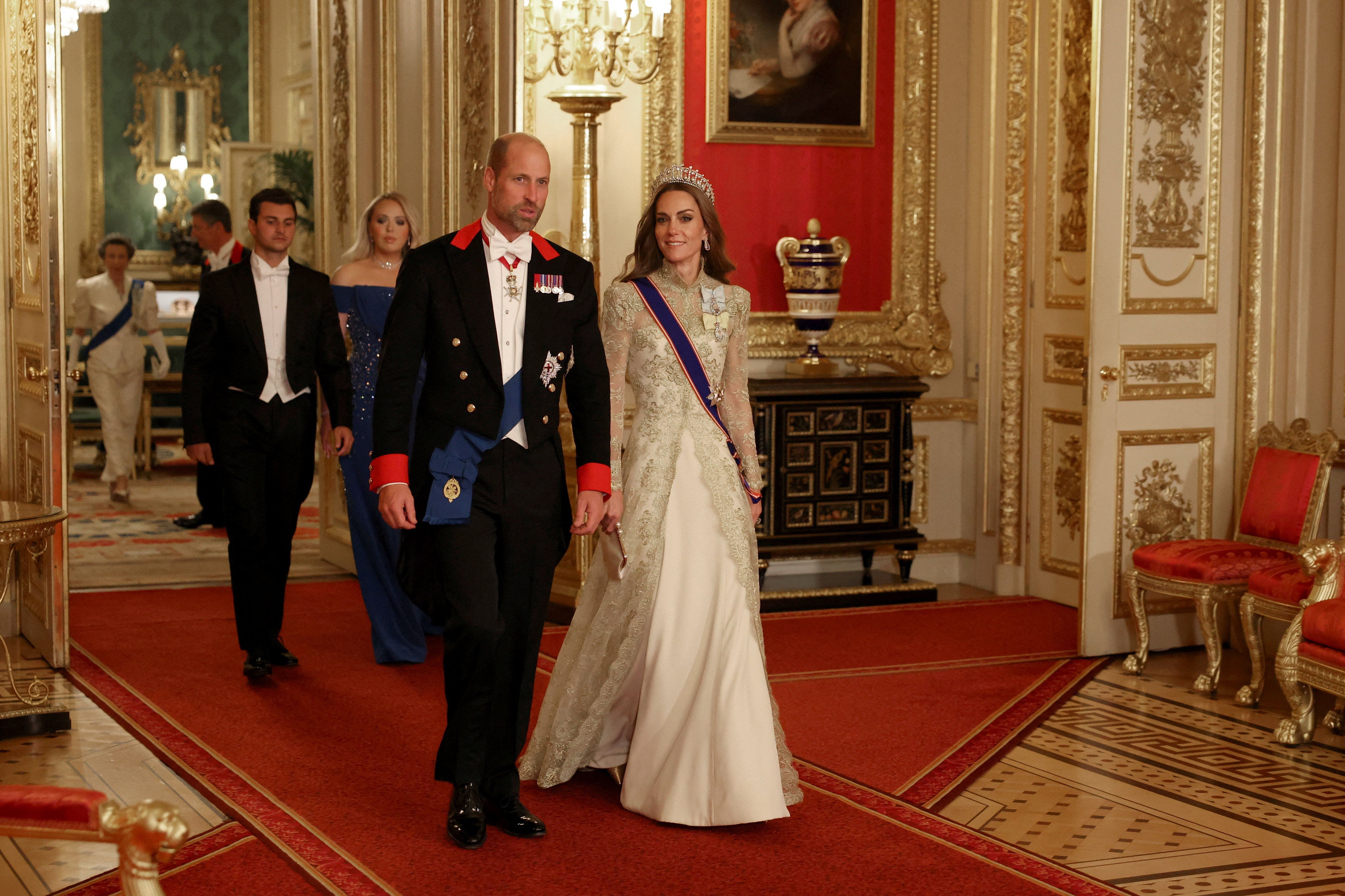 The Prince and Princess of Wales walk into the state banquet for US President Donald Trump at Windsor Castle (Phil Noble/PA)