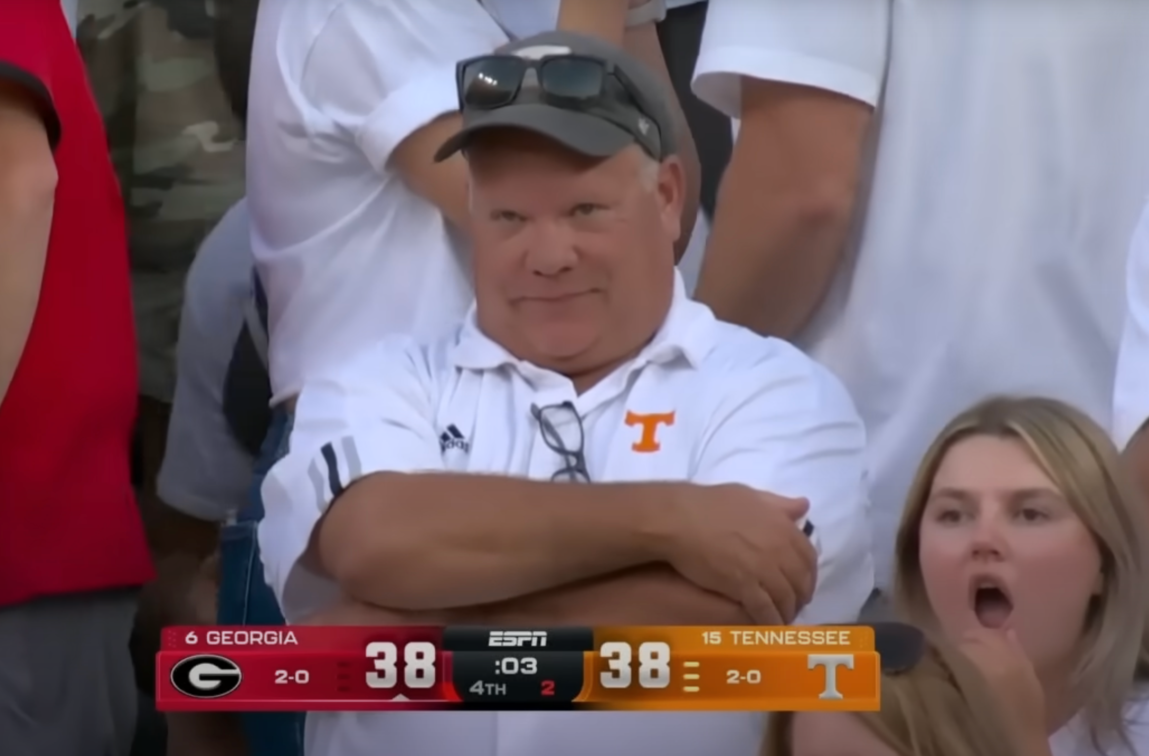 ‘I got Coldplayed!’: College football fan who called in sick to catch Georgia take on Tennessee rumbled after appearing on giant screens