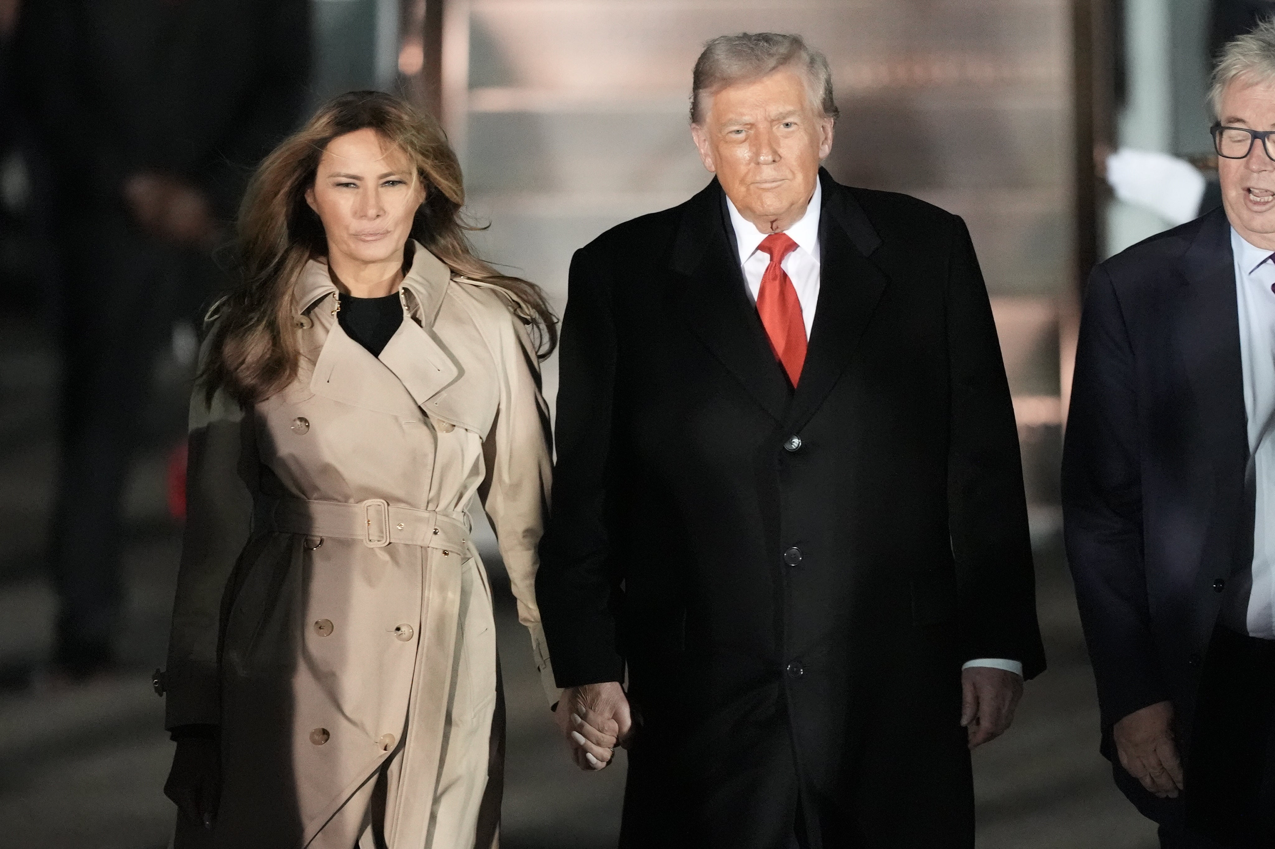 Donald and Melania Trump arrive at Stansted airport on Tuesday night