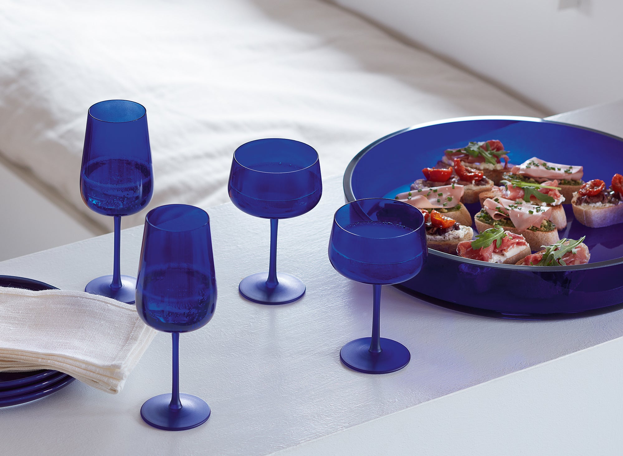 LSA Collective glass bowl and flute glasses