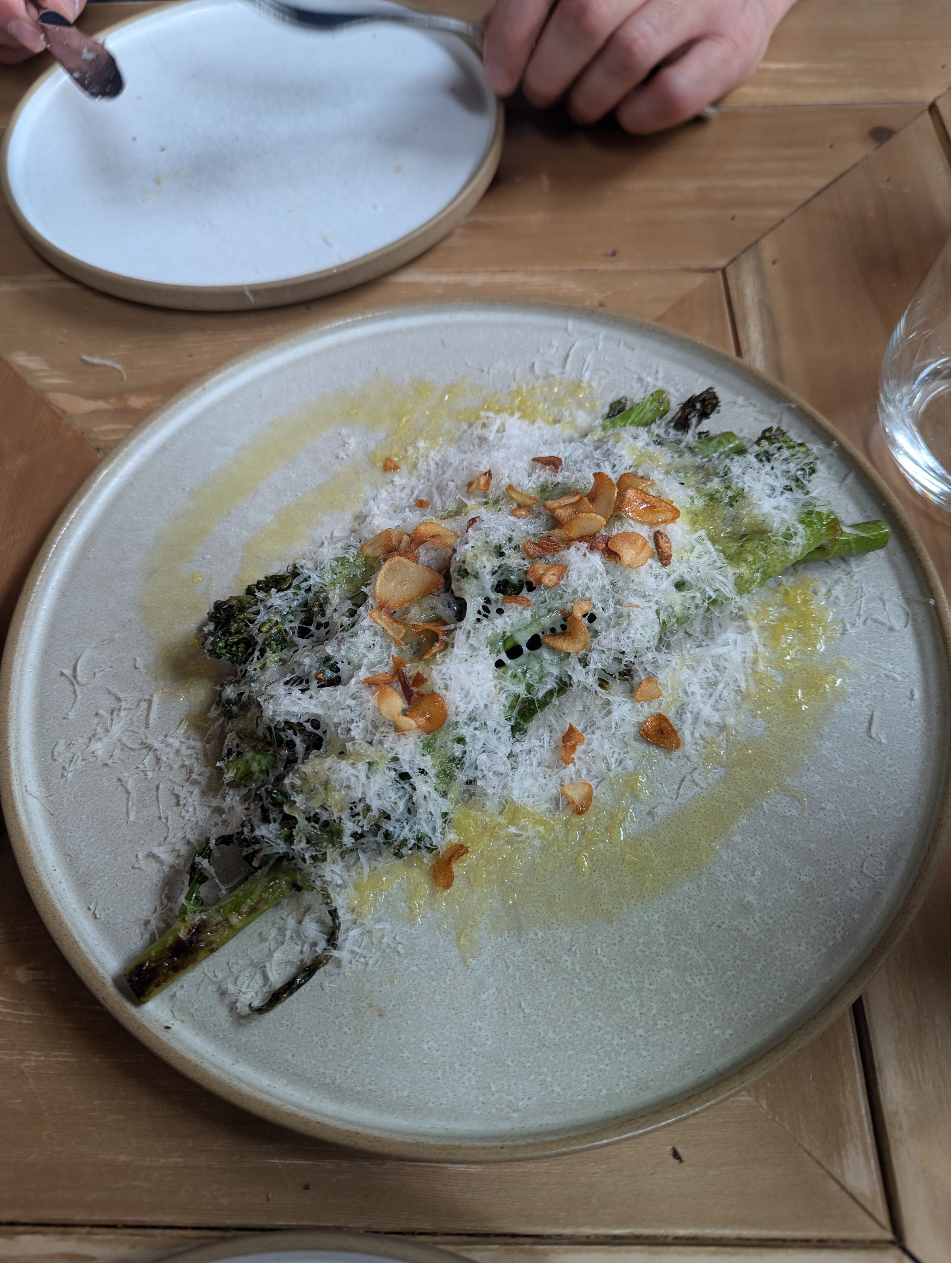 Proof that even greens can steal the show: Bruco’s parmesan-dusted broccolini arrives with crunch, garlic and a touch of fire from the open kitchen