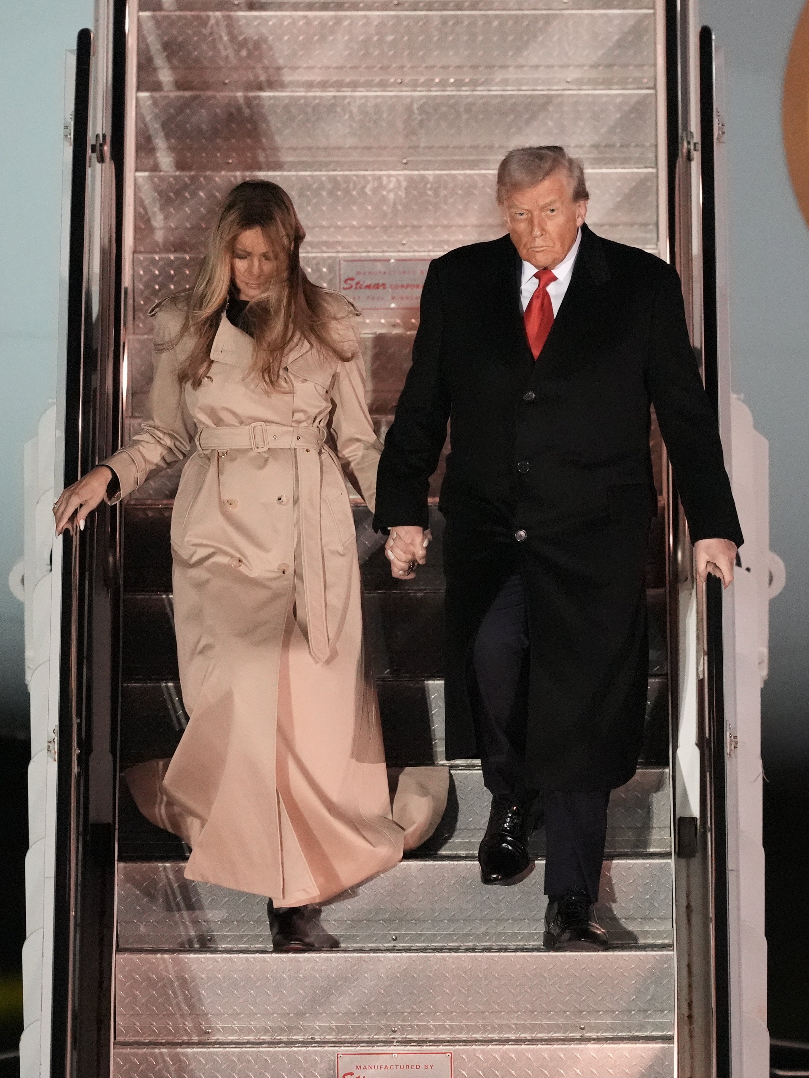 Melania paired the Burberry coat with Dior boots, while the rest of the look was made by designers like Celine and Michael Kors