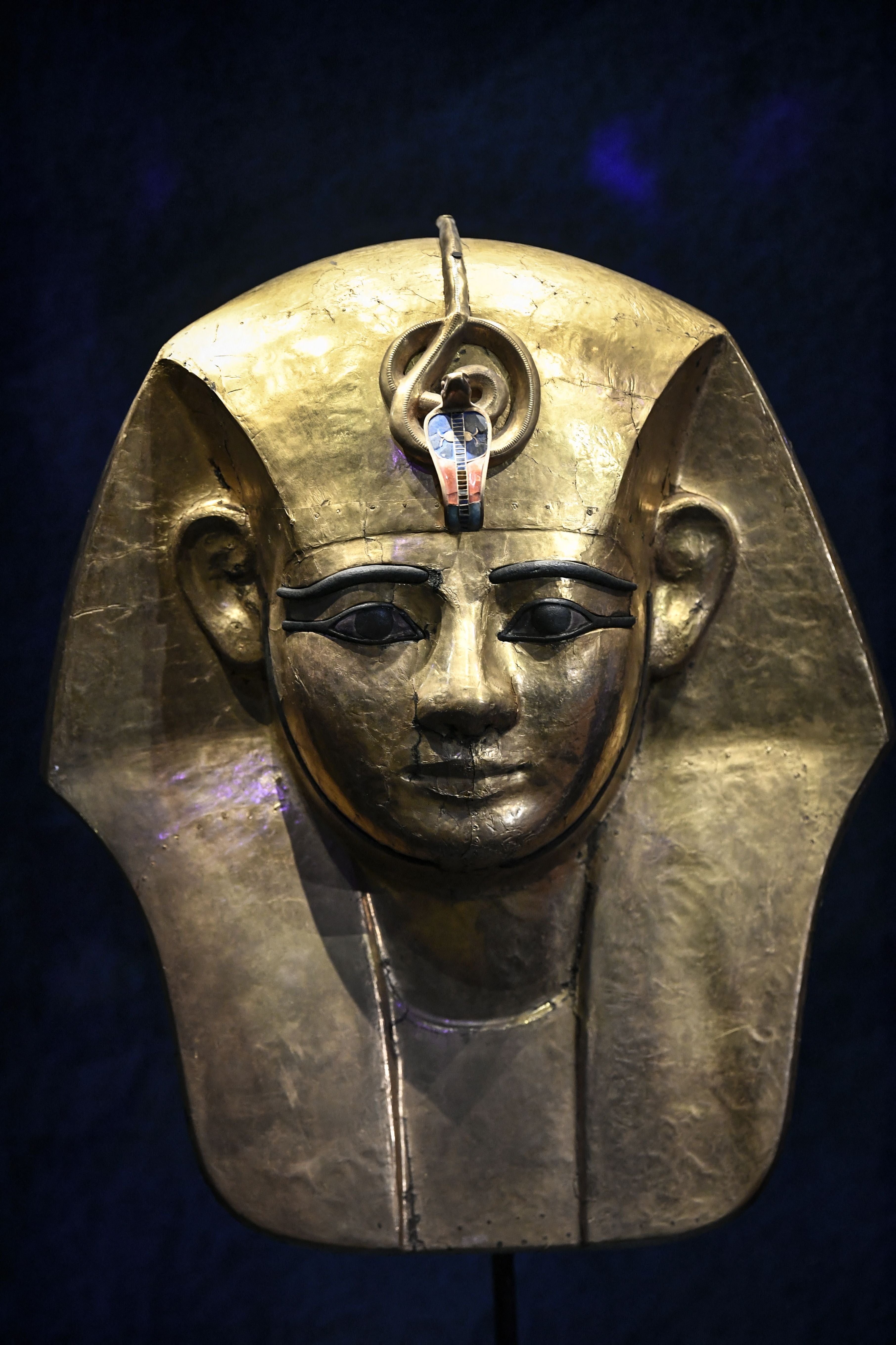 The Gilded Wooden Mask from the coffin of Amenemope displayed prior to the opening of Ramses II exhibition at the Grande Halle de La Villette in Paris