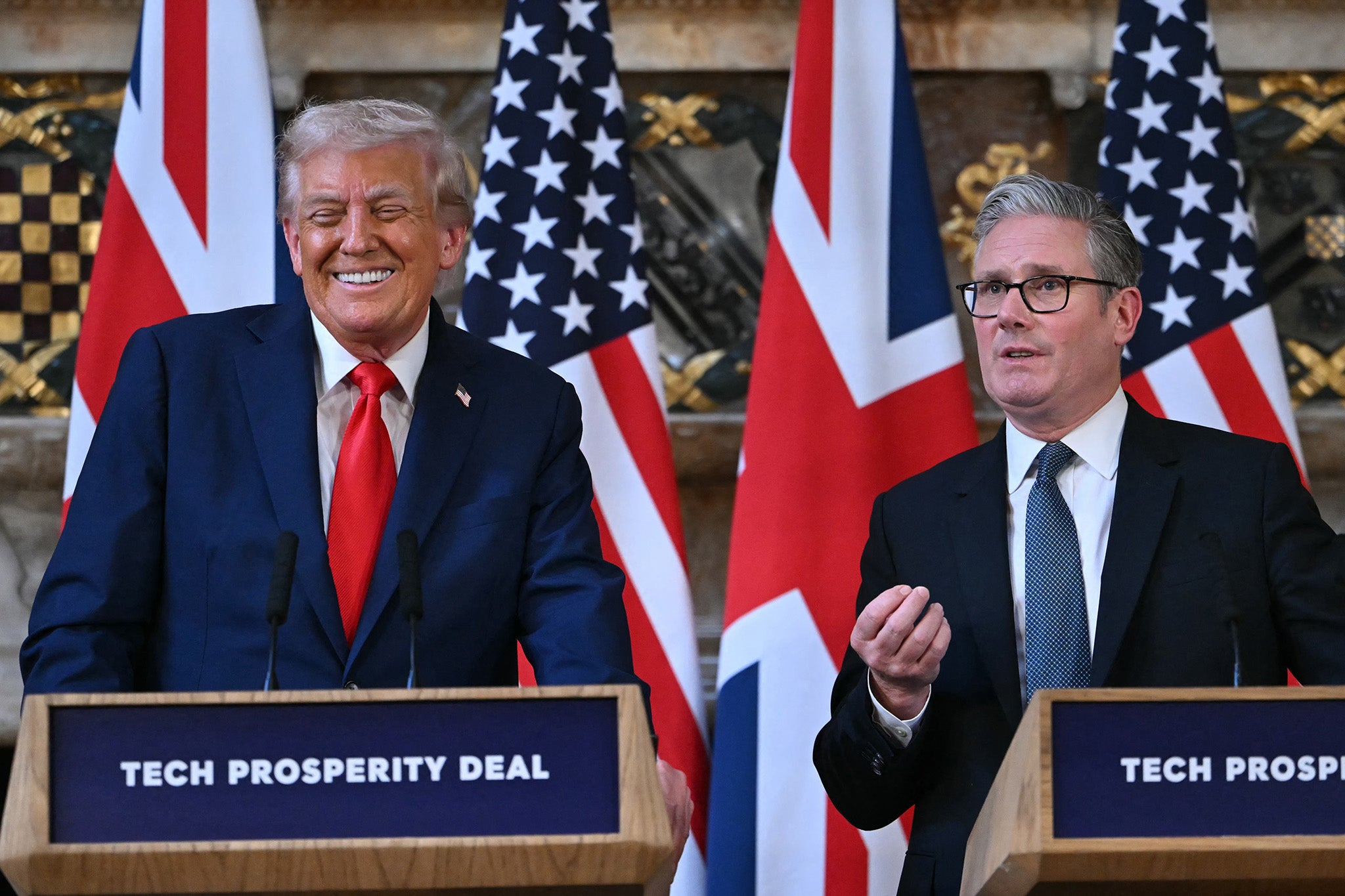 US President Donald Trump (L) gestures as Britain's Prime Minister Keir Starmer speaks during a joint press conference following their meeting at Chequers, in Aylesbury, central England, on September 18, 2025, on the second day of the US President's second State Visit.