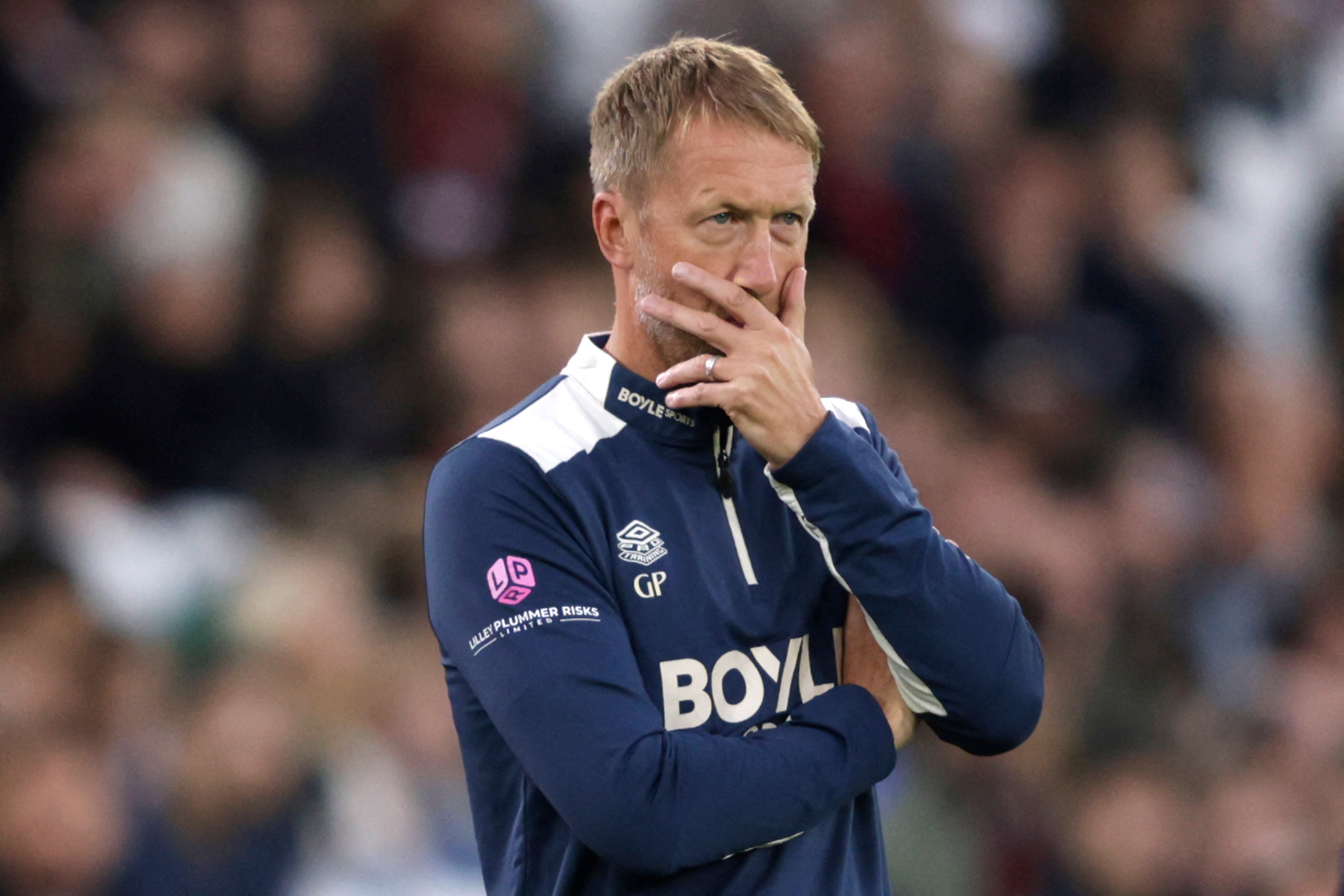 West Ham United's English head coach Graham Potter looks on after going down 3-0 to Spurs