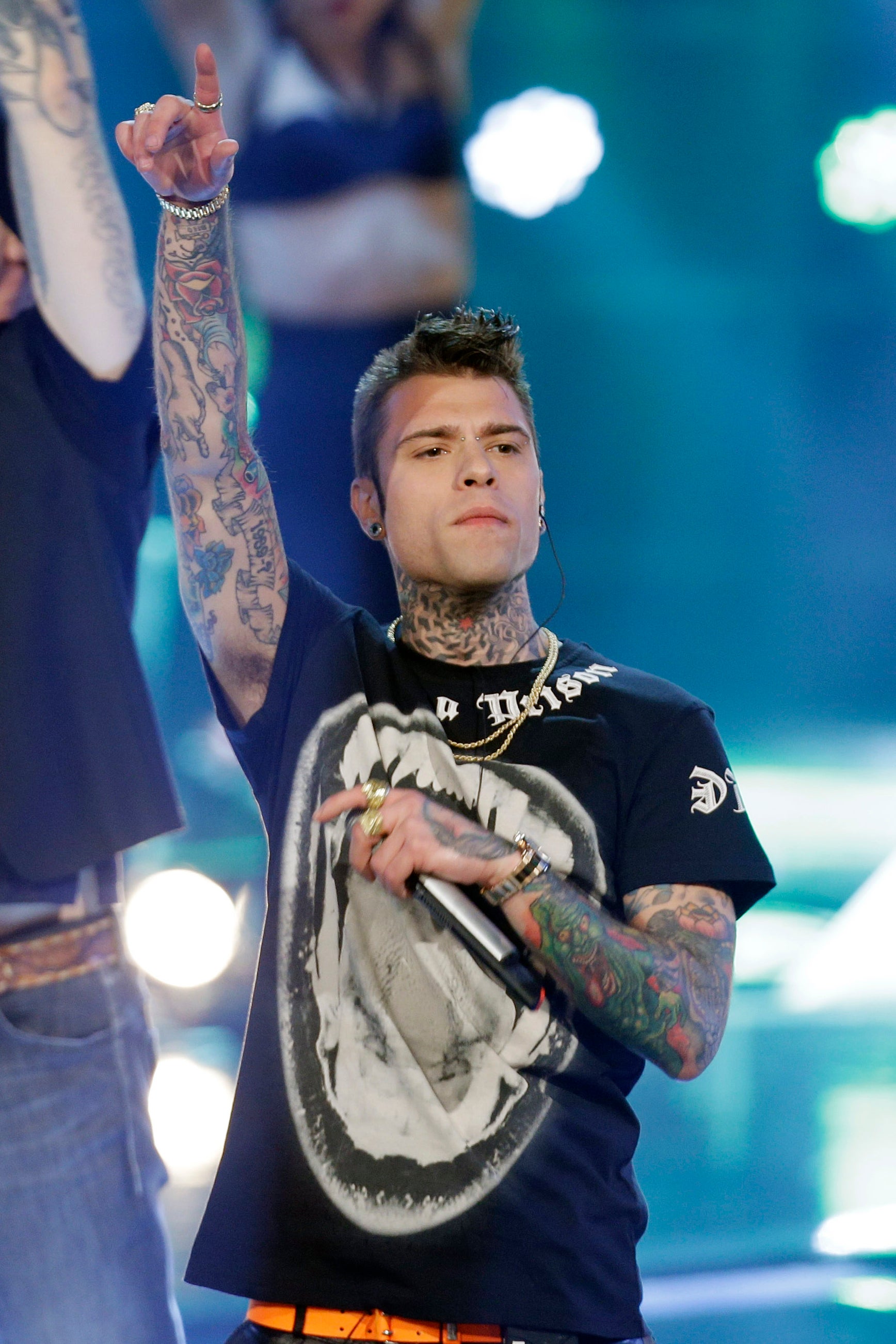 In this photo taken on May 28, 2014, Italian rapper Fedez perform during the Italian State RAI TV program ‘The Voice of Italy’, in Milan, Italy