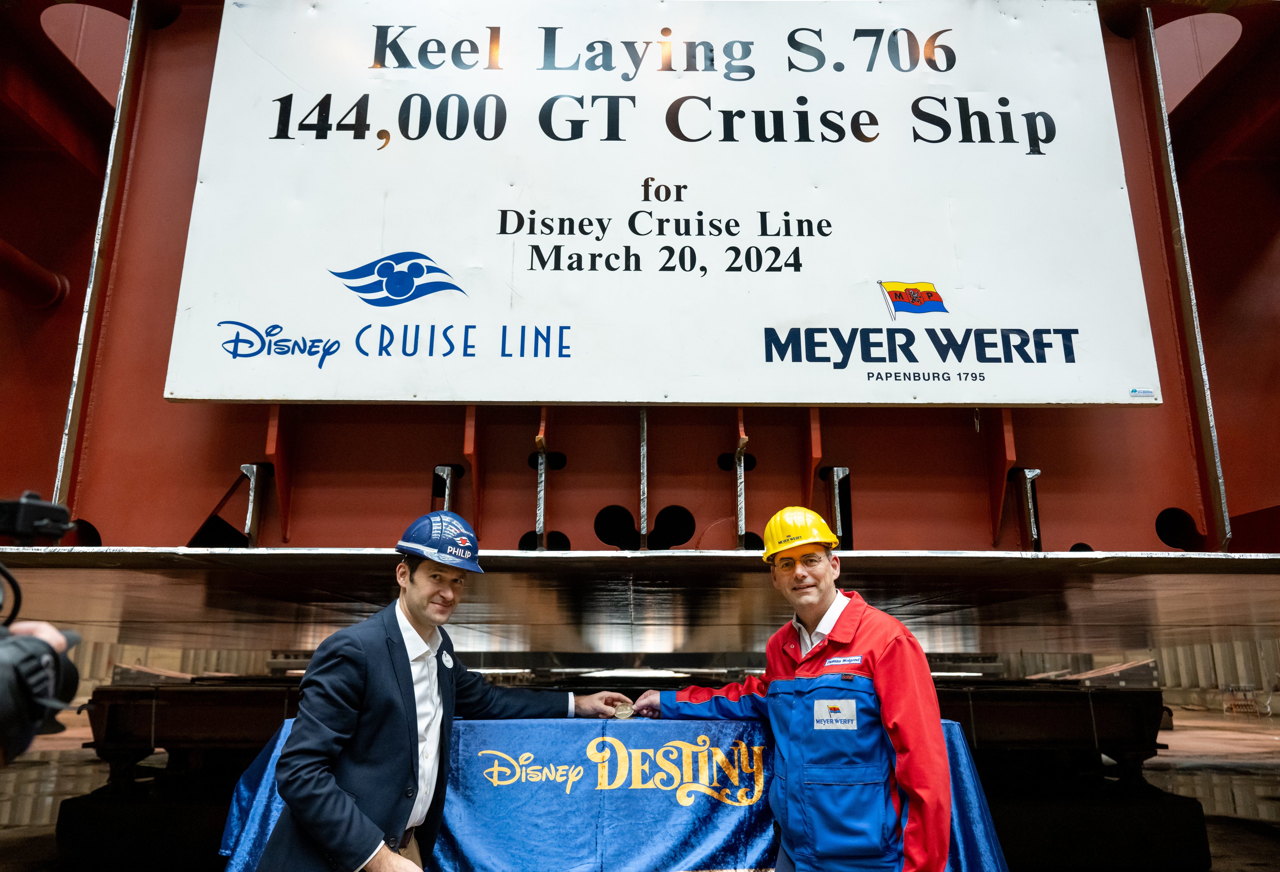 Philip Gennotte (left) at the keel laying for Disney Destiny in 2024