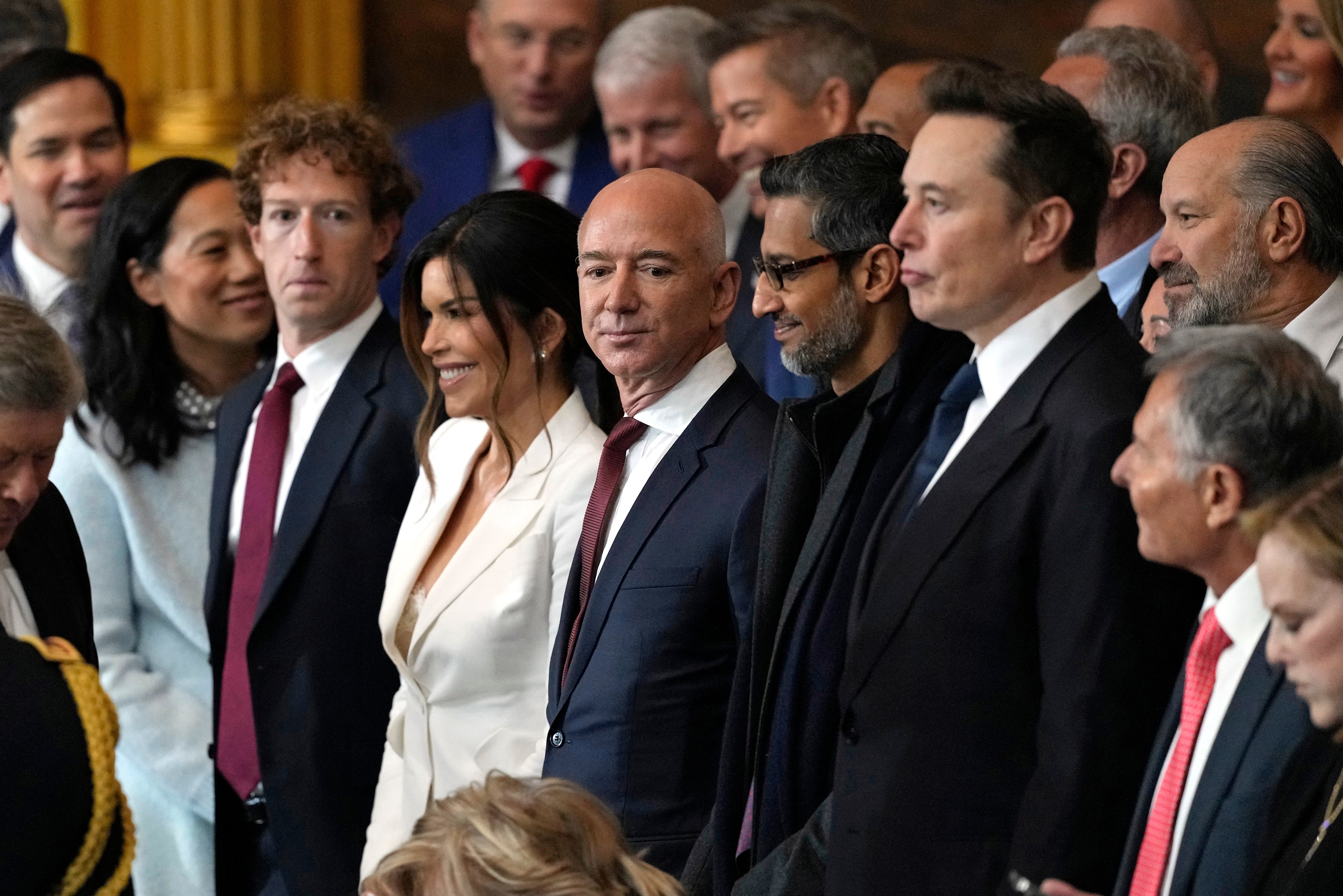 Hot Tech: (from left), Mark Zuckerberg, Lauren Sanchez and her husband, former Amazon CEO Jeff Bezos, and SpaceX CEO Elon Musk attend Trump’s inauguration on 20 January