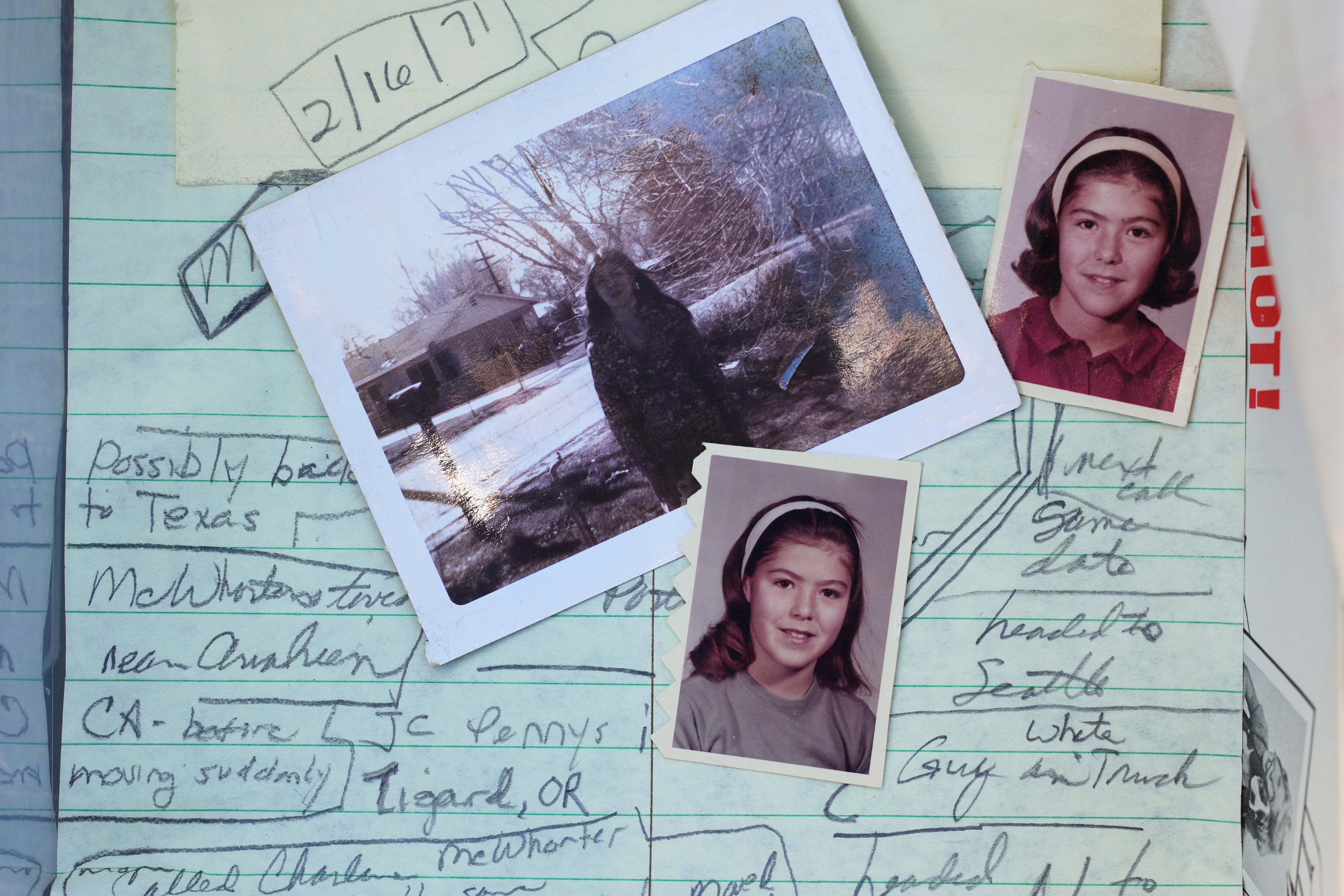 Family photos of Marion Vinetta Nagle McWhorter, who disappeared in 1974 in Oregon and whose remains were recently confirmed by DNA from her sister Valerie Nagle, are seen over notes taken by Nagle about McWhorter's disappearance Thursday, Sept. 18, 2025, in Seattle. (AP Photo/Lindsey Wasson)