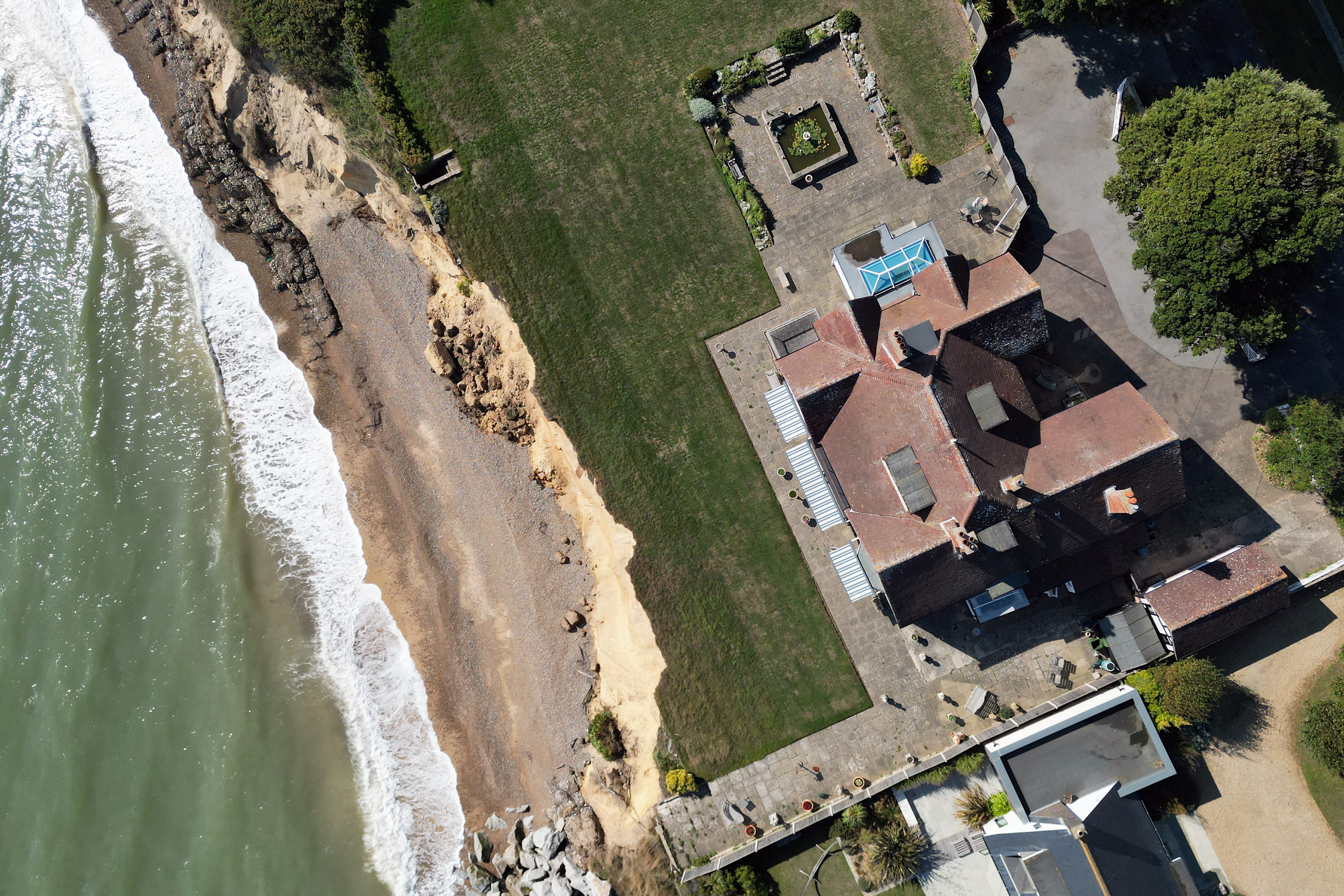 The home of Jean Flick, 88, in Thorpeness, Suffolk, which is at risk of falling into the sea following coastal erosion (Joe Giddens/ PA)