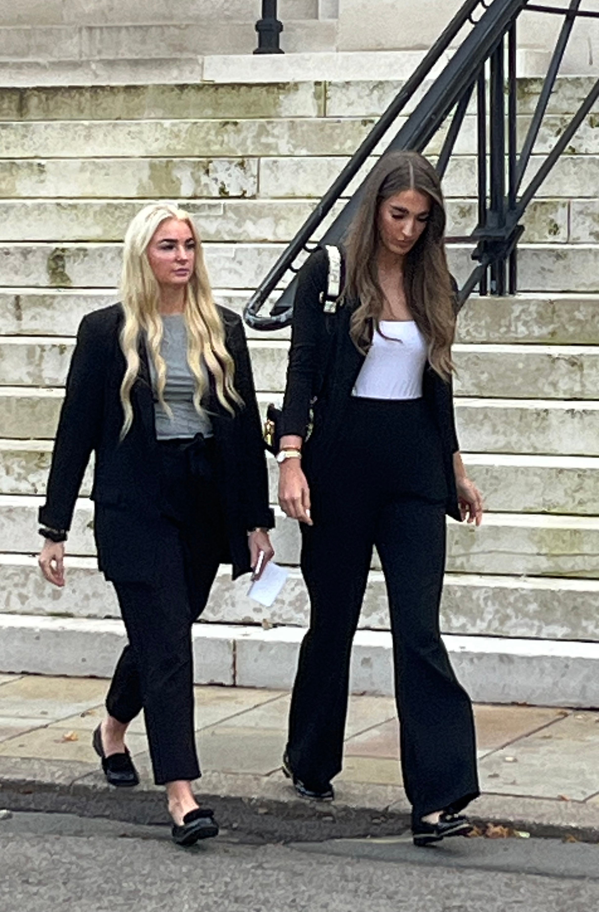 Former prison worker Megan Breen (left) leaves Cardiff Crown Court after receiving a suspended prison sentence for admitting misconduct in public office after forming a relationship with a prisoner at HMP Prescoed, a category D open prison, in Gwent, while working there as an operational support grade worker. Picture date: Friday September 19, 2025