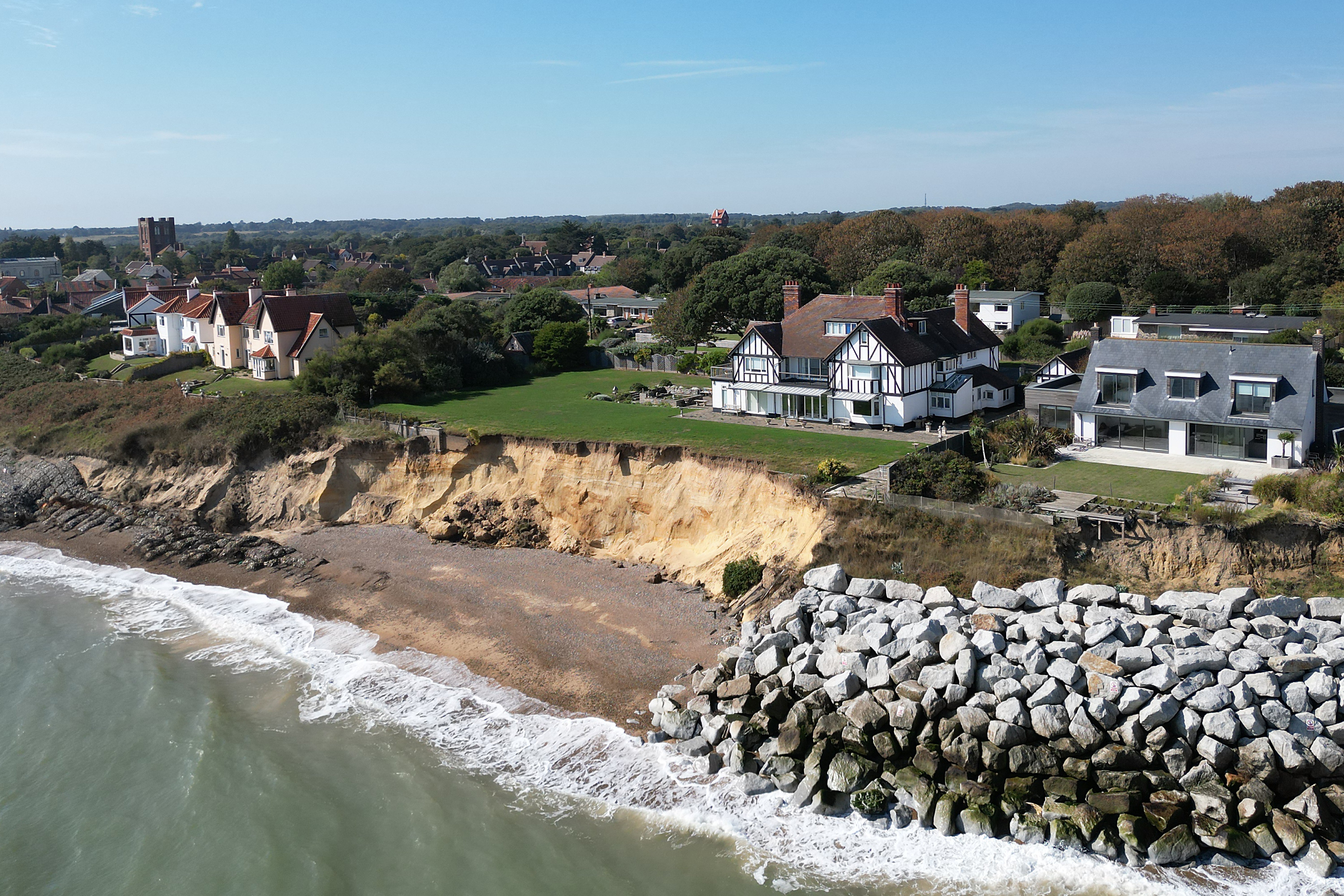Ms Flick hopes to stay in her home (centre of picture) as long as she can but has had someone round to look at demolition (Joe Giddens/PA)