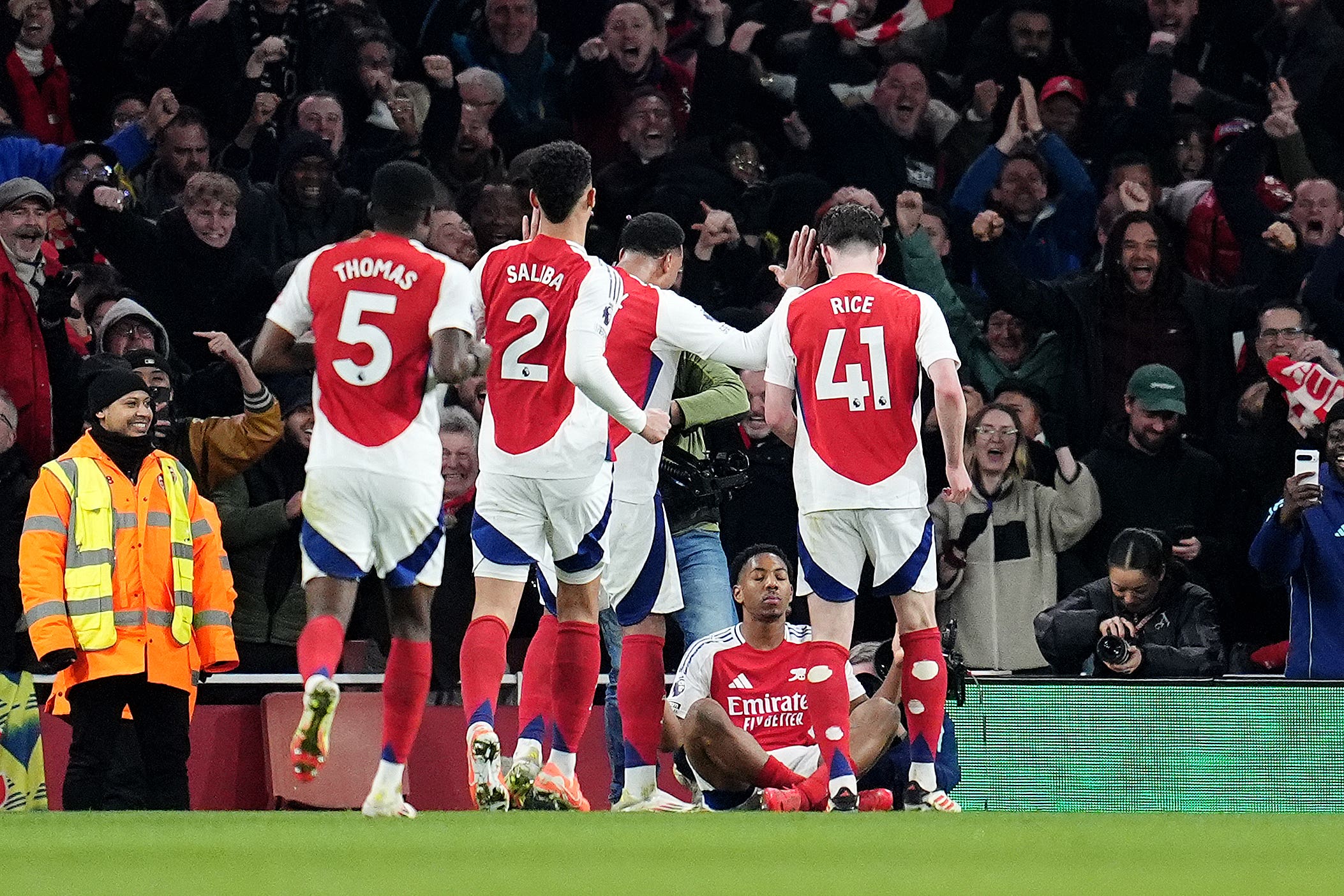 Arsenal’s Myles Lewis-Skelly (second right) imitates Erling Haaland’s zen goal celebration after scoring against Manchester City (Adam Davy/PA).