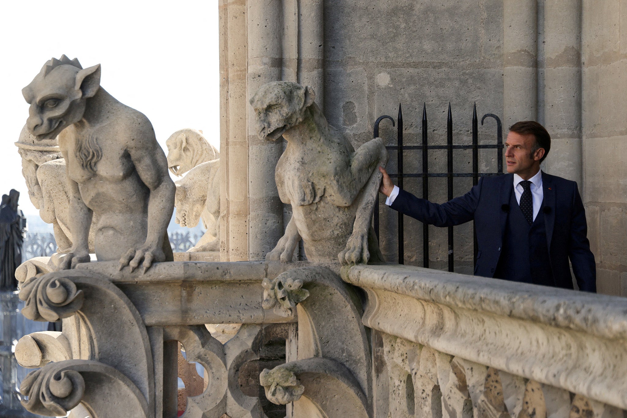 Macron (pictured) has ruled out stepping down