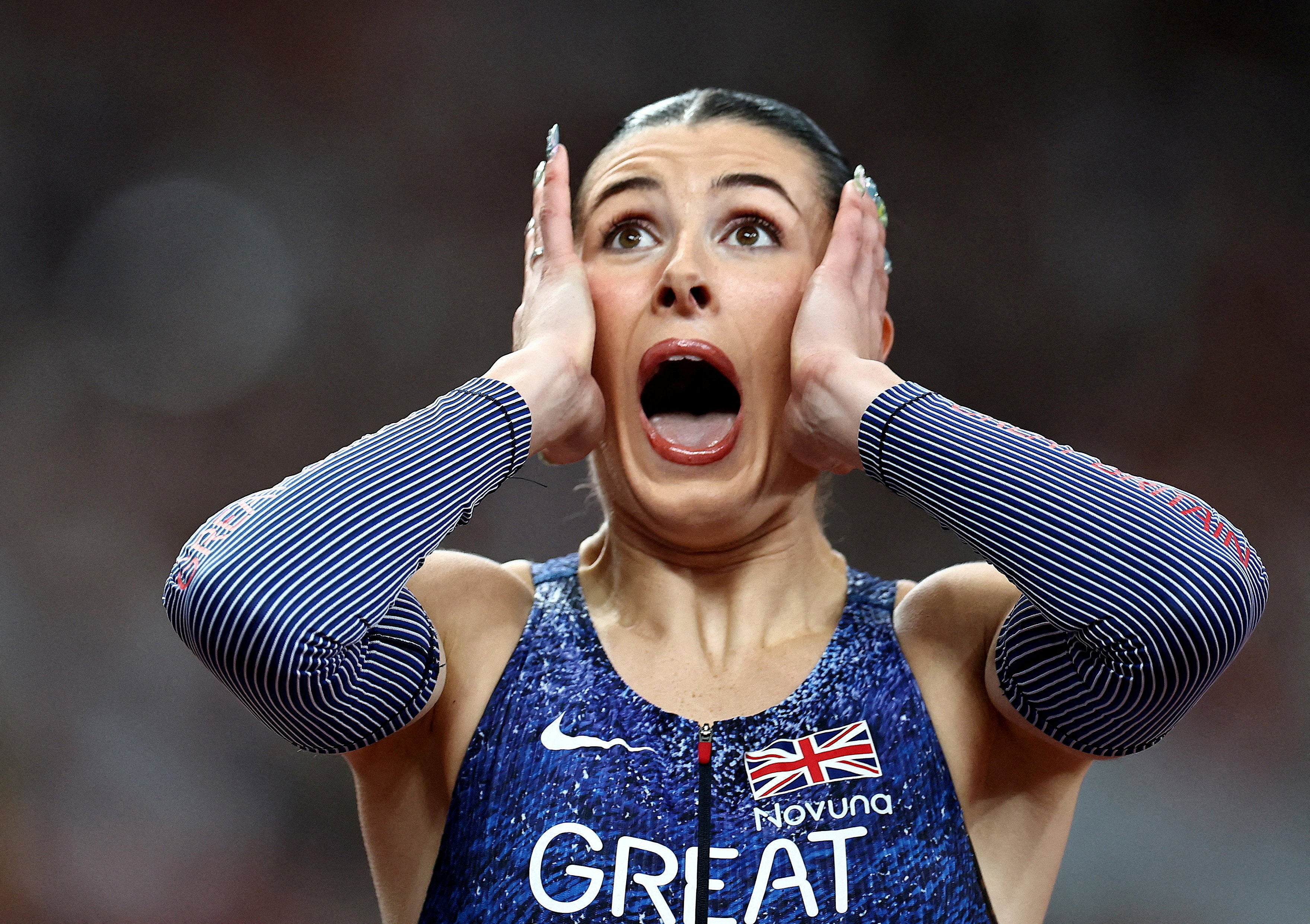 <p>Amy Hunt reacts after winning world championship silver in the 200m </p>