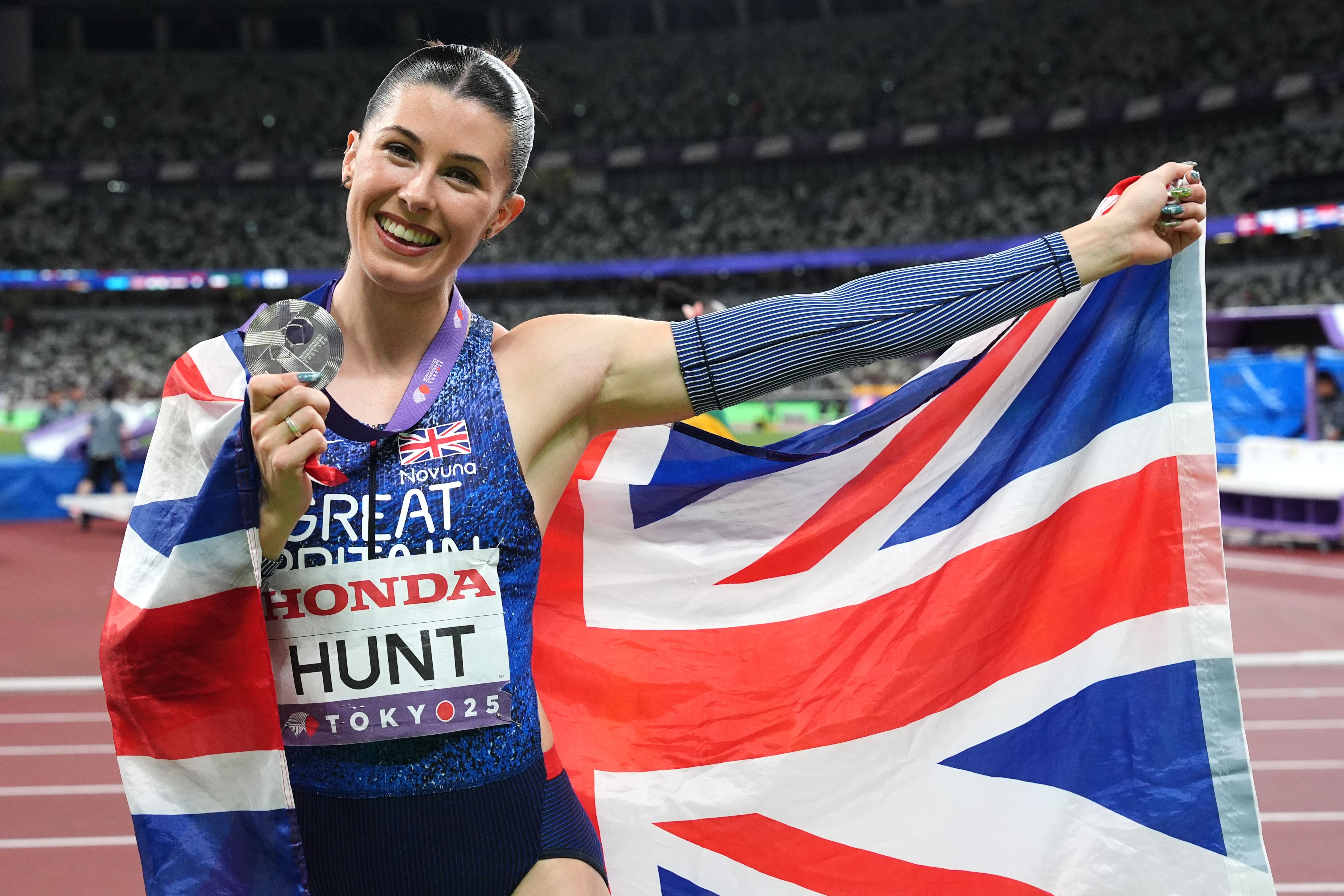 Great Britain’s Amy Hunt celebrates winning 200m silver at the World Championships