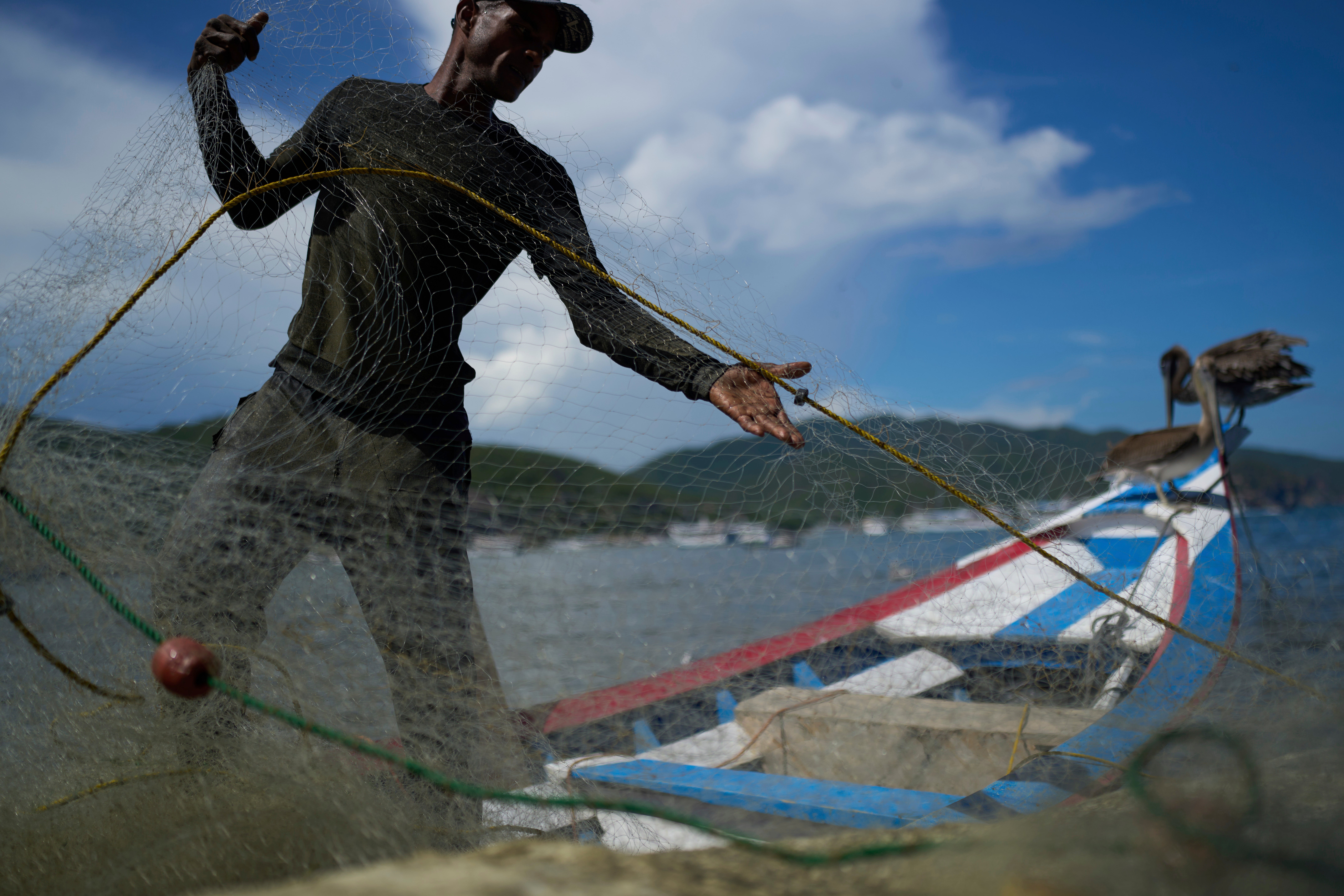 APTOPIX Venezuela Fishing Community