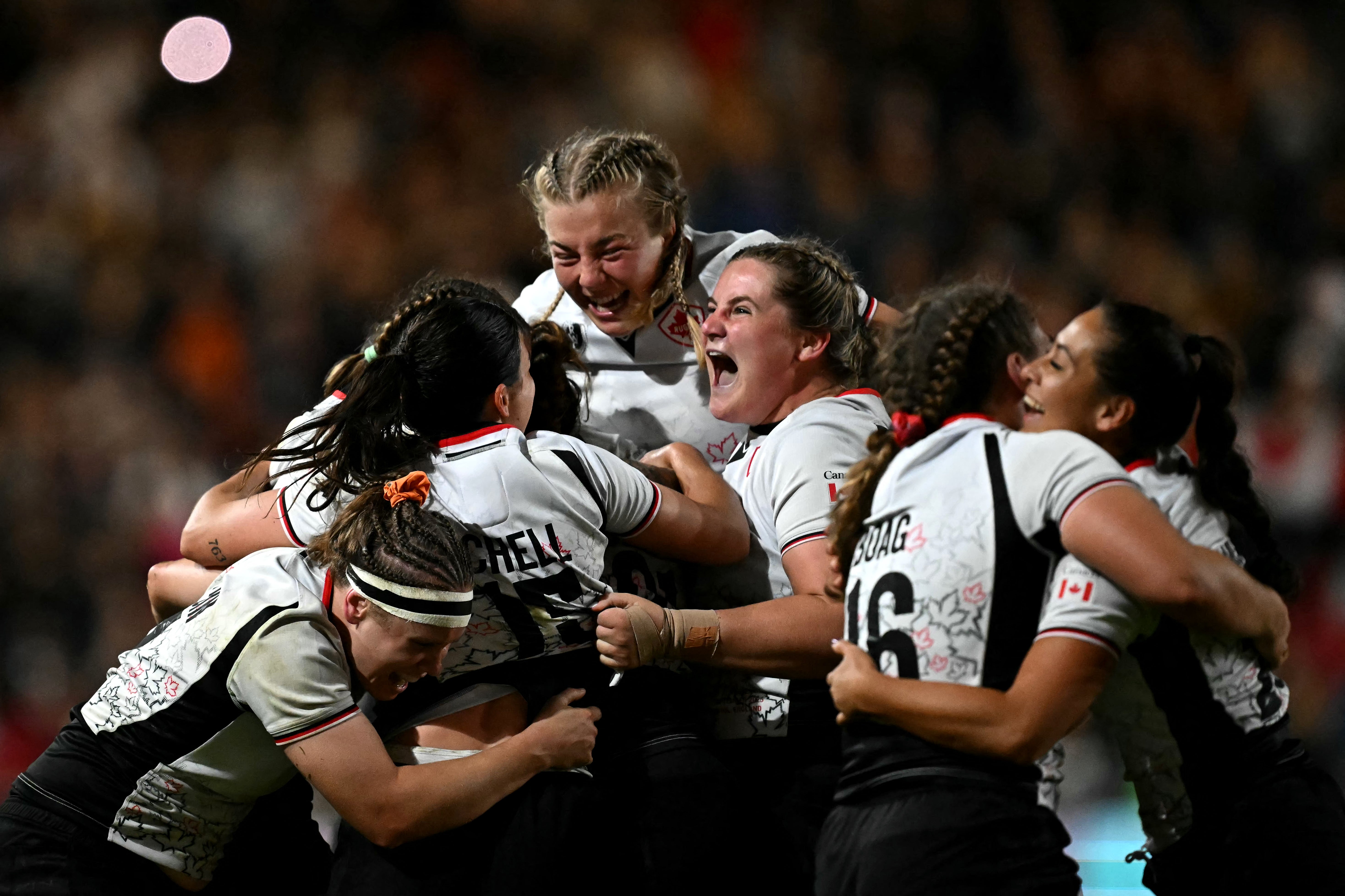 Canada players celebrate after beating New Zealand in the World Cup semi-finals