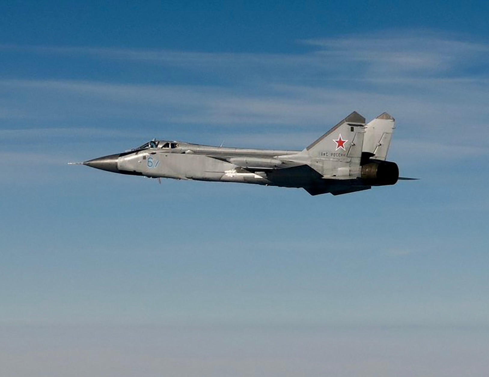 This September 19, 2025 Hand Out image released by the Swedish Airforce shows a Russian MIG-31 fighter jet flying above the Baltic sea after violating Estonian air space