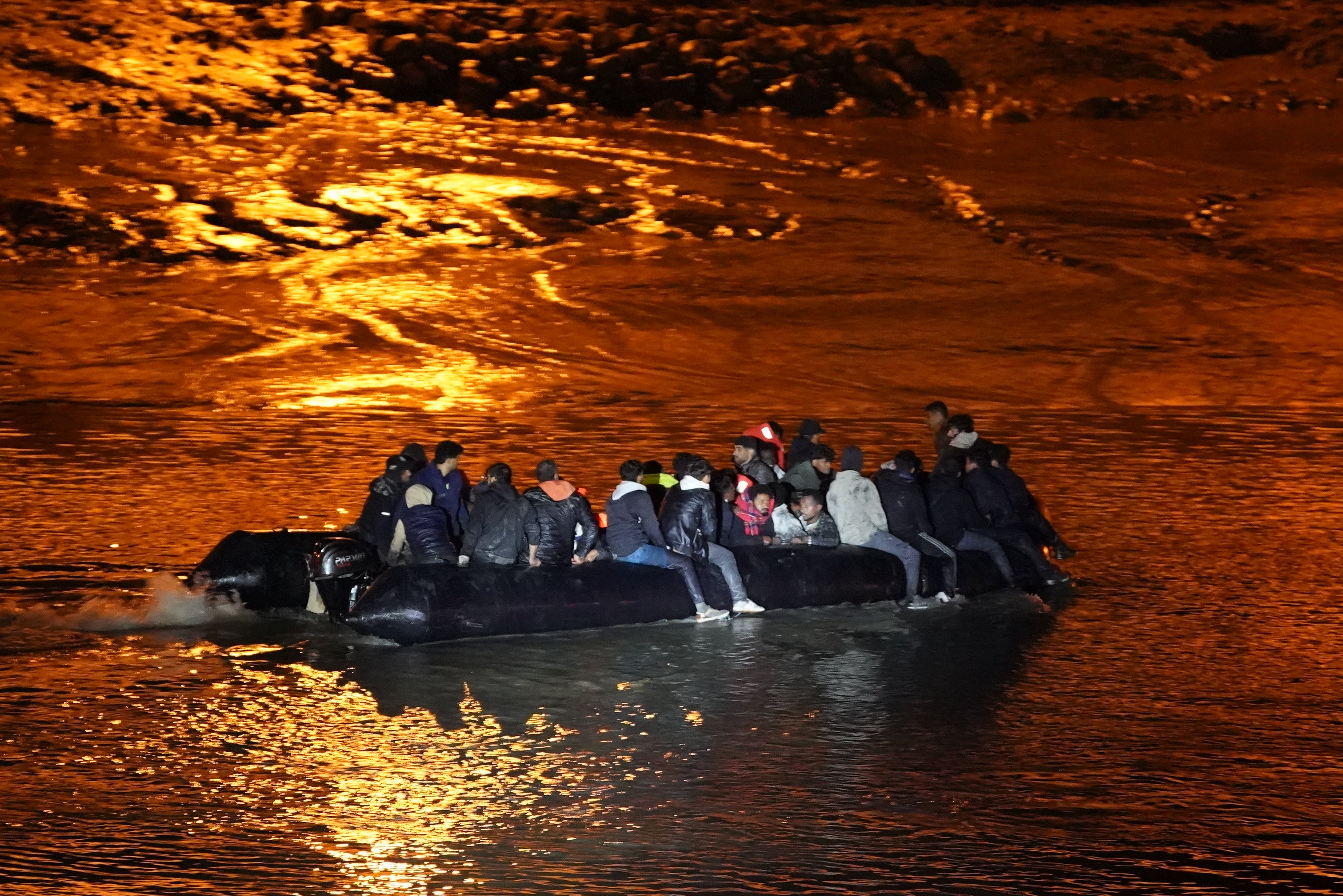 A small boat carrying people thought to be migrants near the French coast on Friday morning