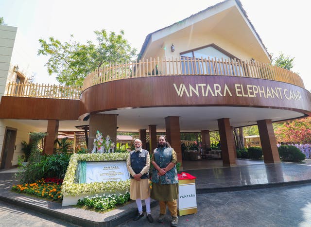 <p>Indian pime minister Narendra Modi and Anant Ambani, son of Indian billionaire Mukesh Ambani, pose for a photograph after the inauguration of the Vantara zoo in Jamnagar, Gujarat, on 4 March 2025</p>