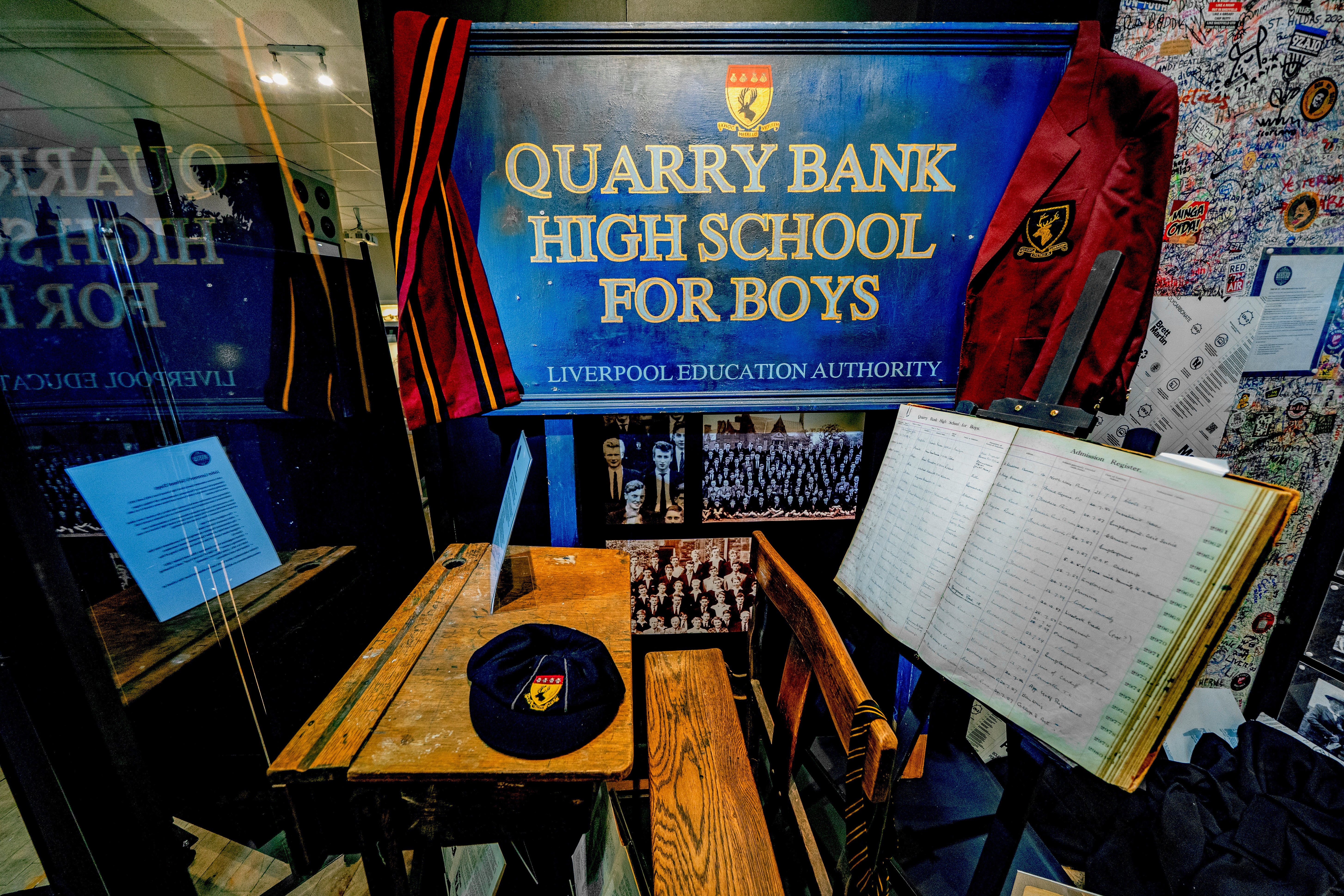 The school desk of former Beatles frontman John Lennon and the Quarry Bank High School ledger on display at The Beatles Museum