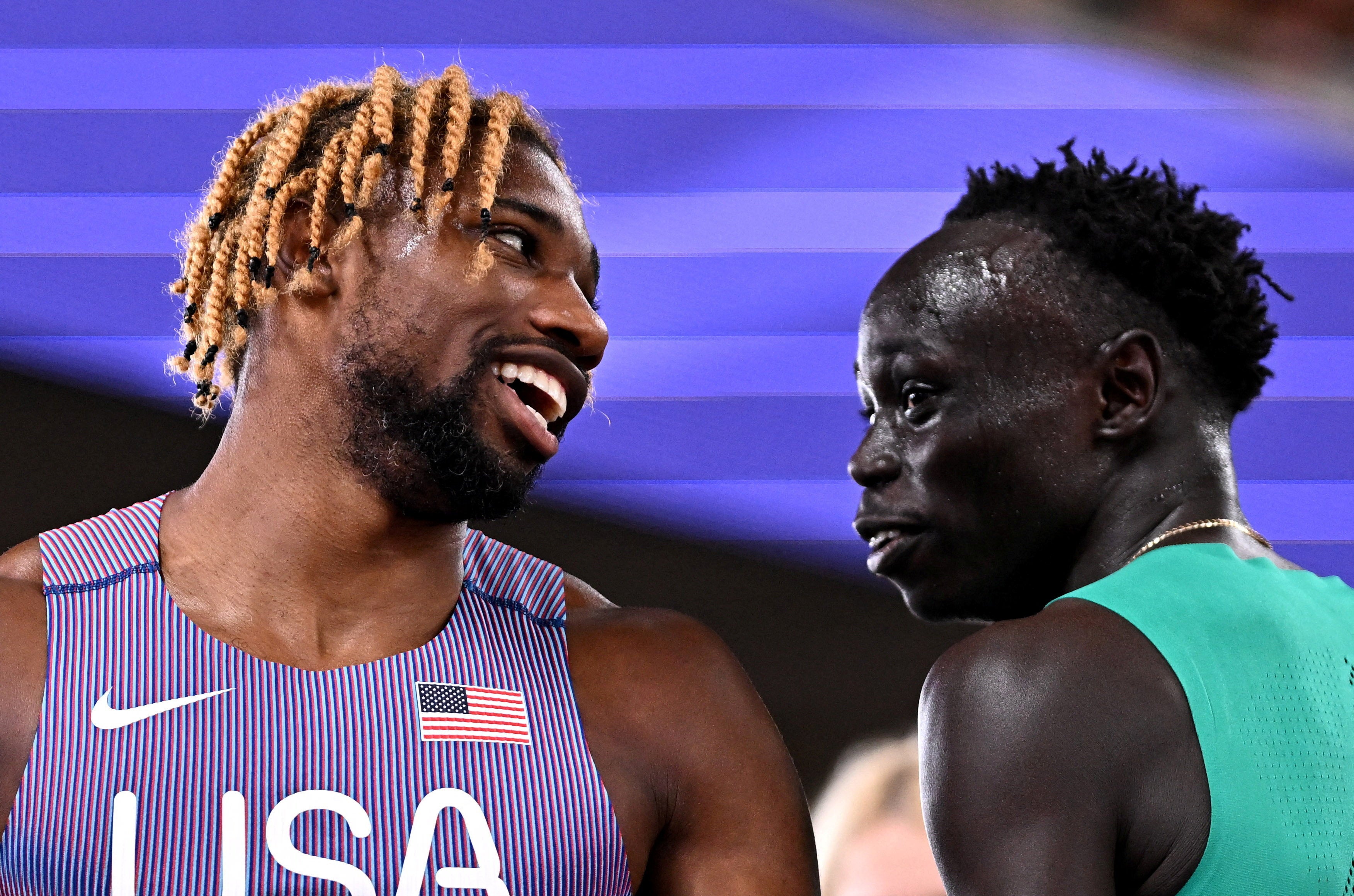 <p>Noah Lyles with teen sprint sensation Gout Gout at the World Athletics Championships in Tokyo</p>