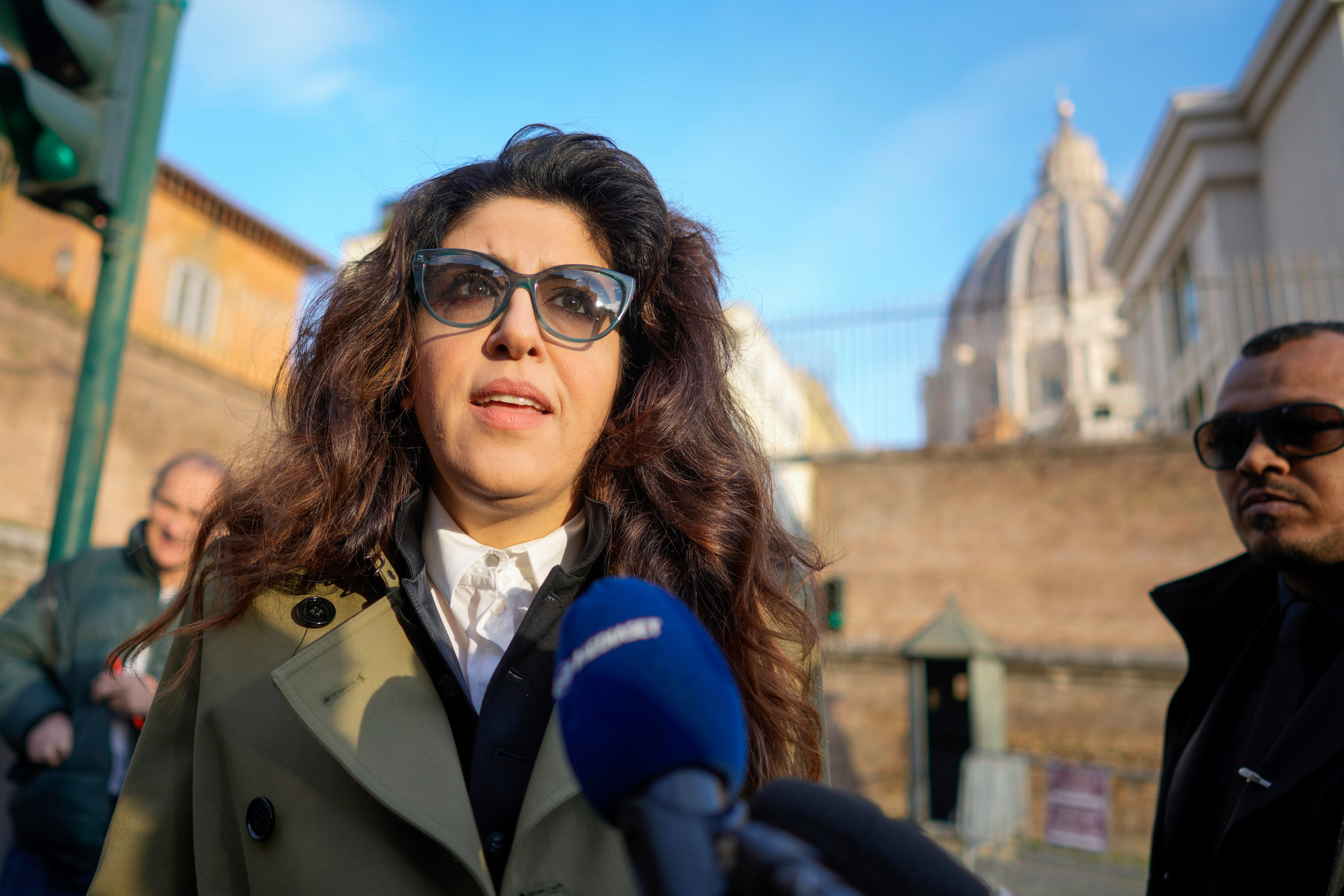 Public relations specialist Francesca Chaouqui talks to reporters as she arrives to testify in a trial at the Vatican, Jan. 13, 2023. (AP Photo/Andrew Medichini, File)