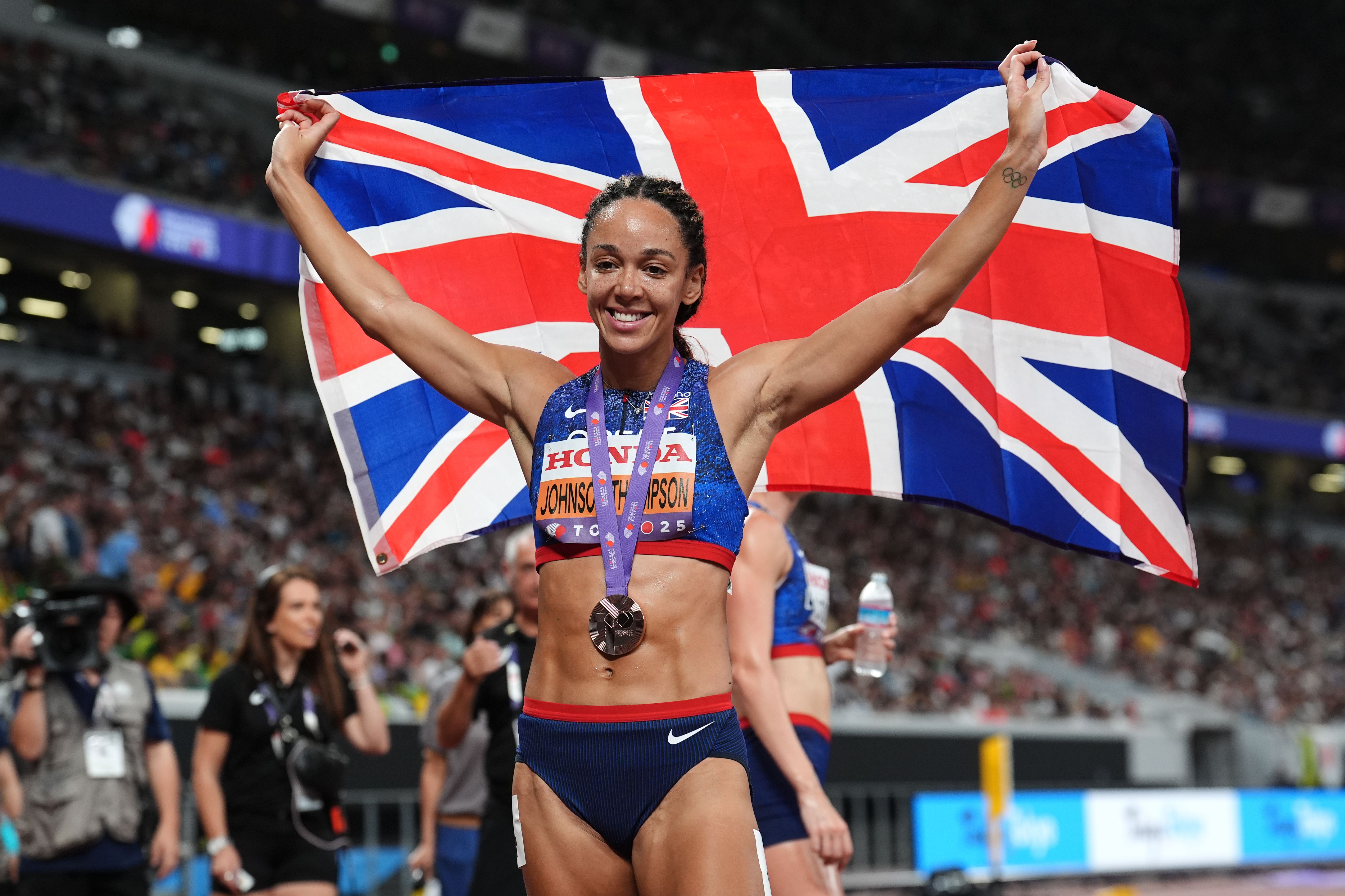Katarina Johnson-Thompson reacts after winning a shared bronze medal (Martin Rickett/PA)