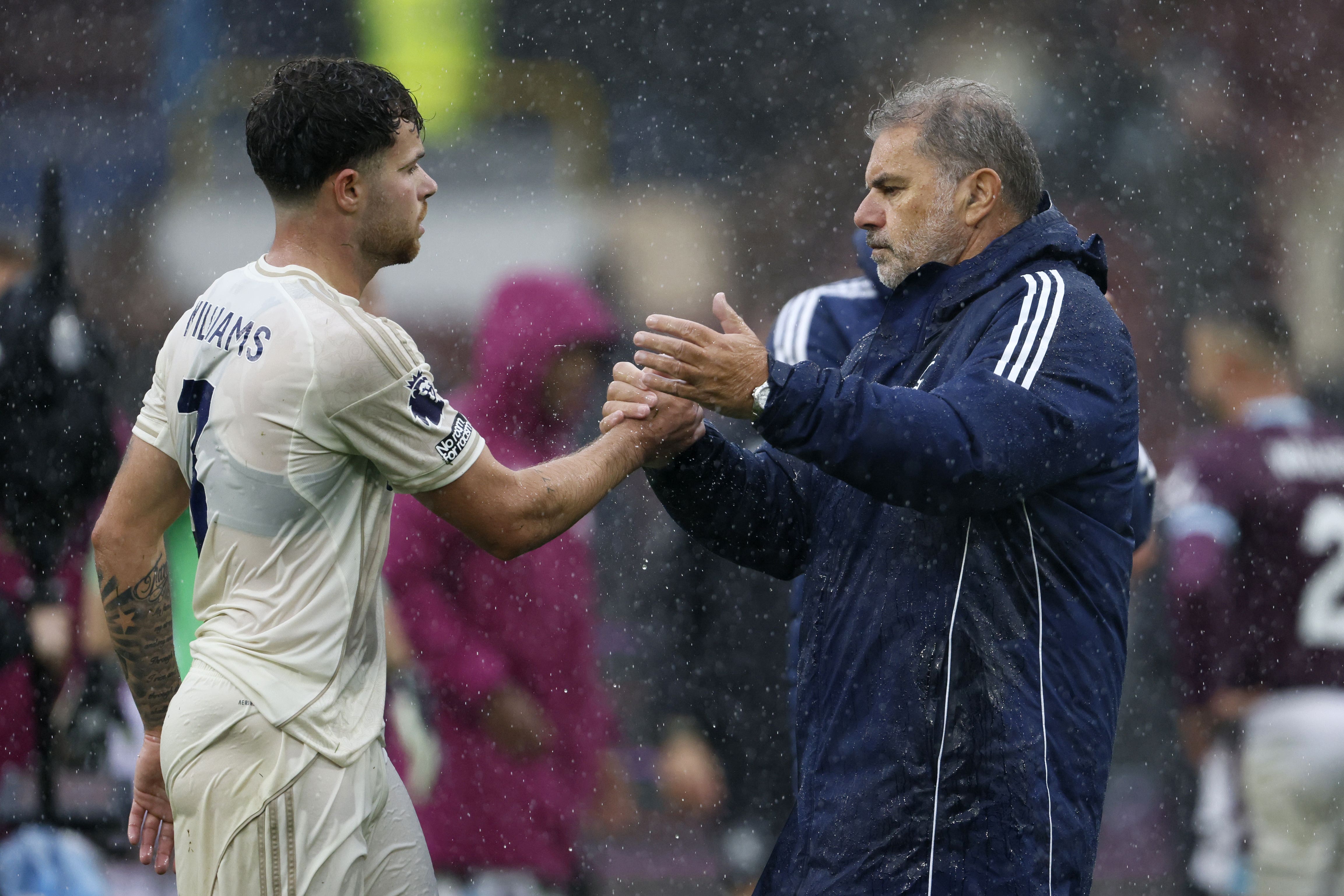 Nottingham Forest manager Ange Postecoglou shakes hands with Neco Williams (Richard Sellers/PA)